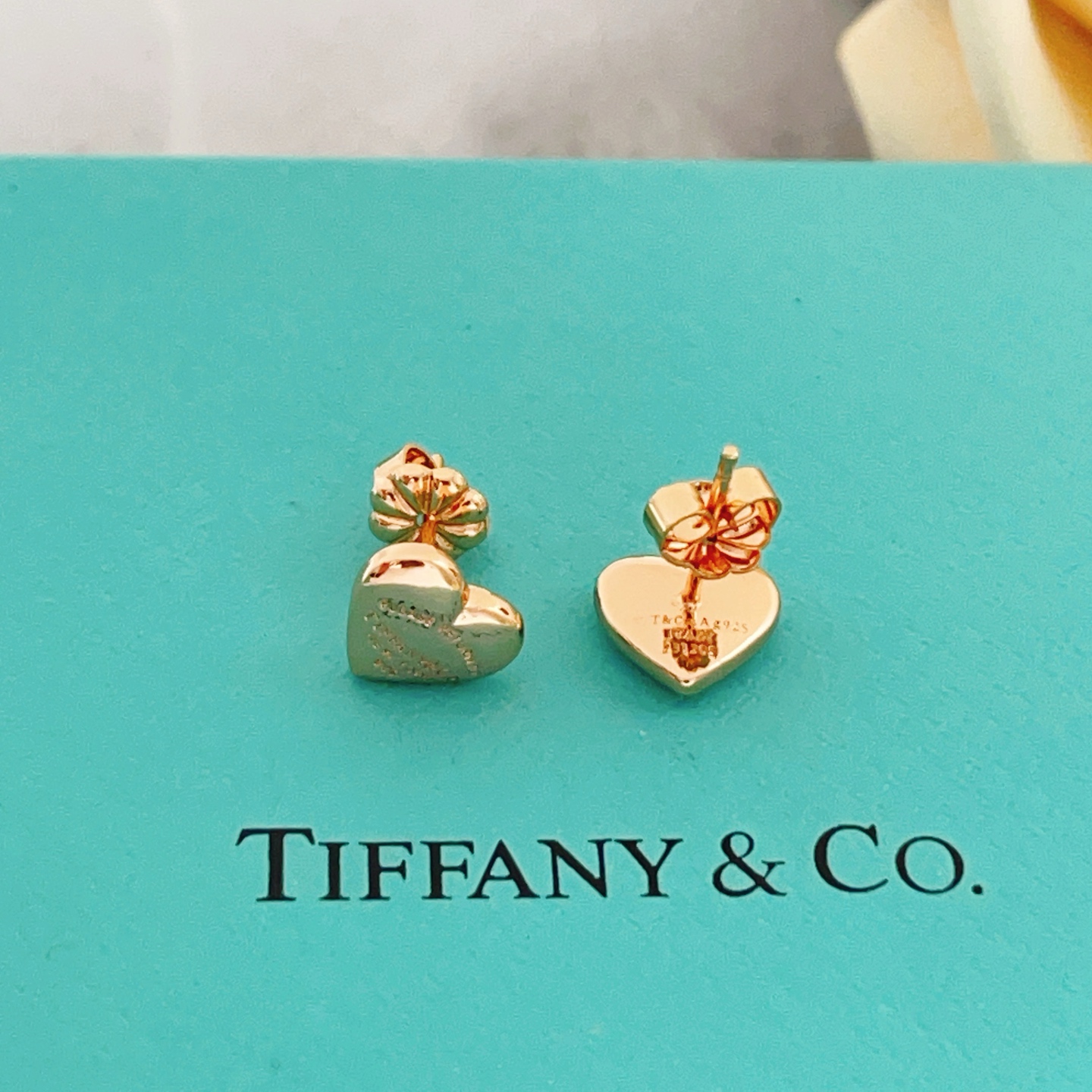 Tiffany Co Return to Tiffany Mini Heart earrings Rose gold-toned metal with engraved text detailing 8mm stud diameter