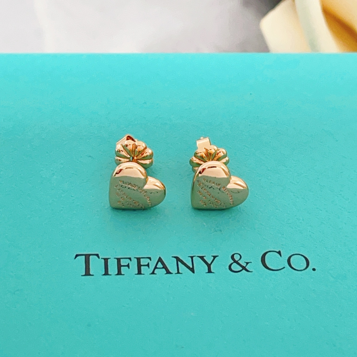 Tiffany Co Return to Tiffany Mini Heart earrings Rose gold-toned metal with engraved text detailing 8mm stud diameter