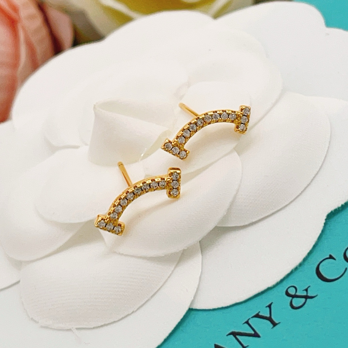 Tiffany Co T Smile earrings yellow gold with clear diamonds 10mm width