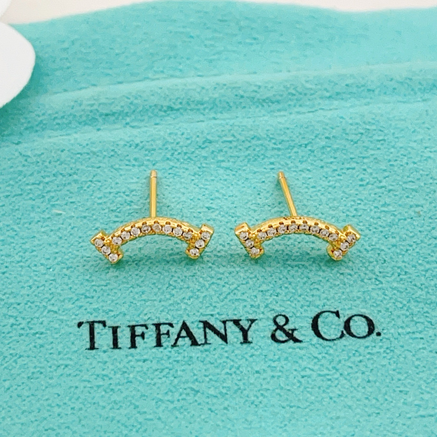 Tiffany Co T Smile earrings yellow gold with clear diamonds 10mm width
