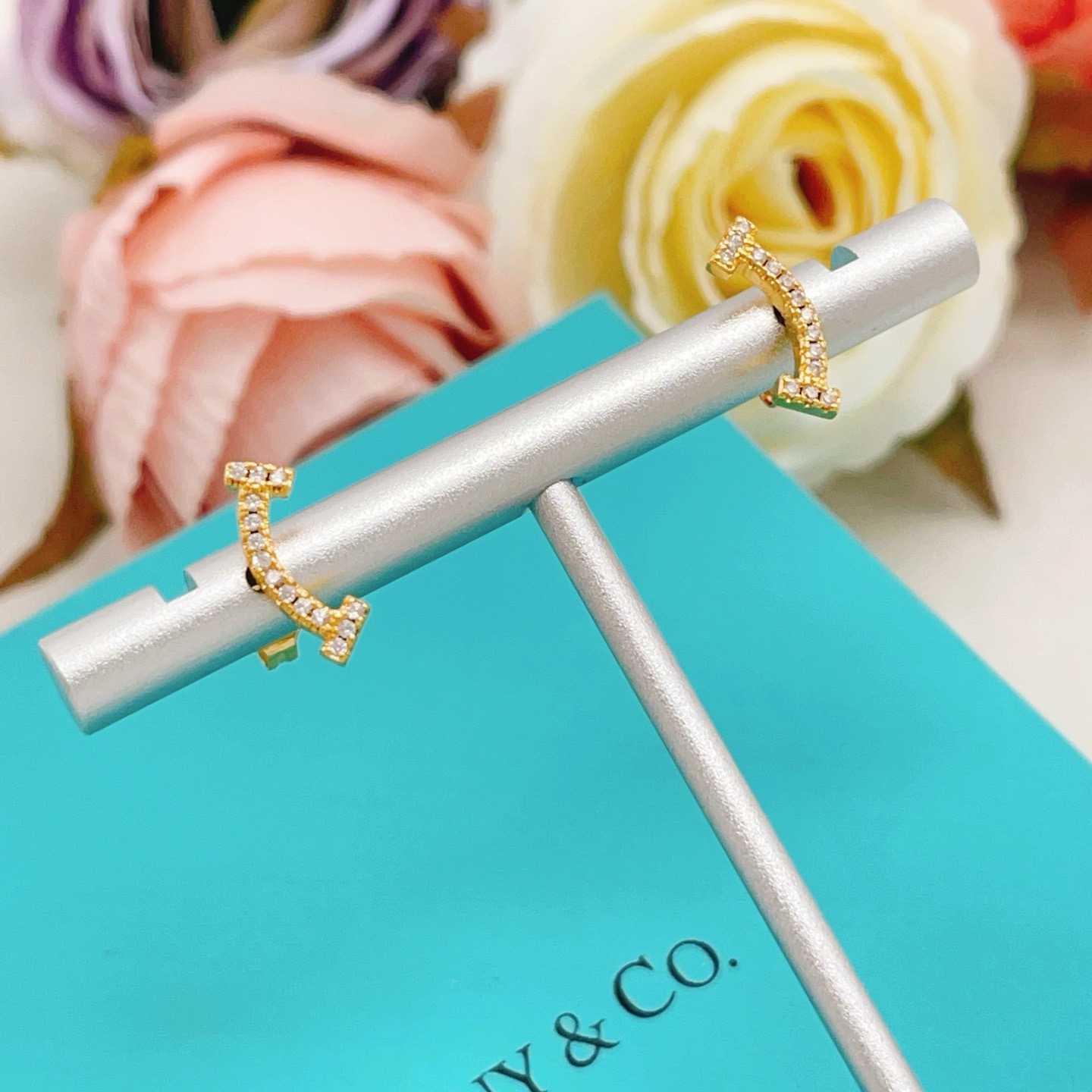 Tiffany Co T Smile earrings yellow gold with clear diamonds 10mm width