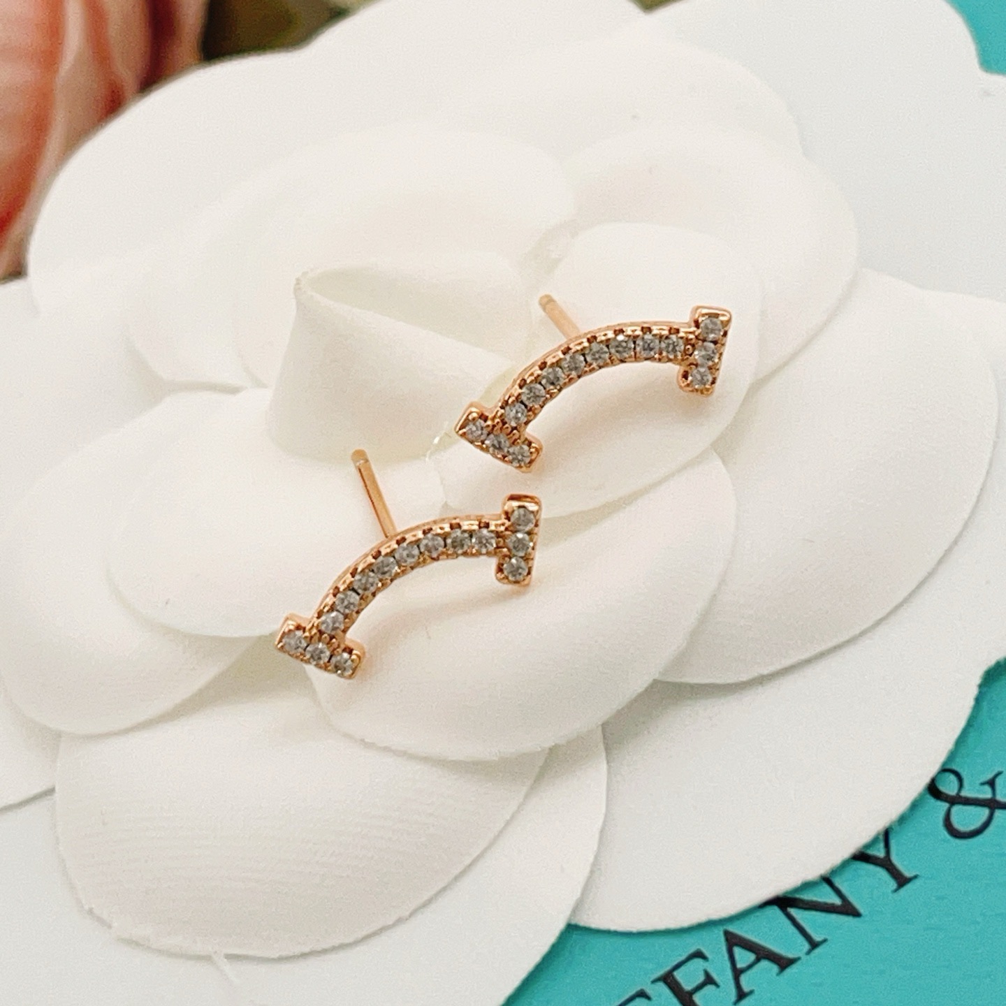Tiffany Co T Smile earrings 18k rose gold with clear diamonds 10mm width