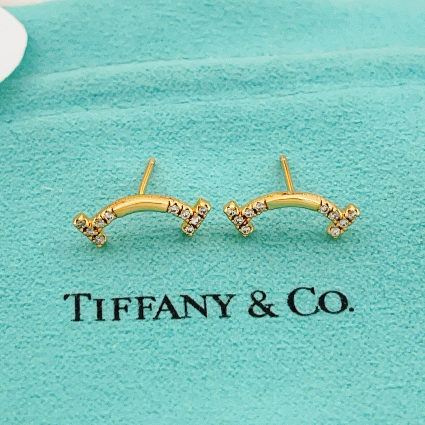 Tiffany Co T Smile earrings yellow gold with clear diamonds 12mm width