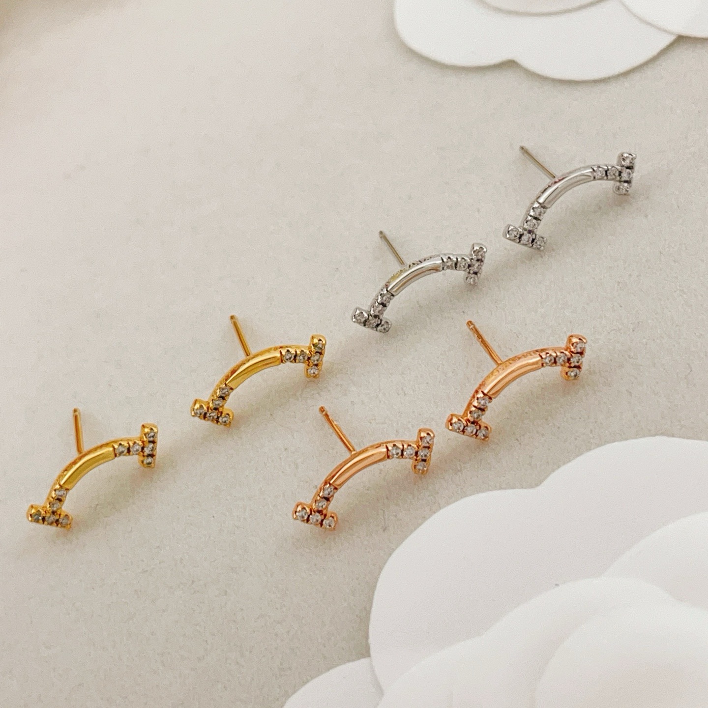 Tiffany Co T Smile earrings yellow gold with clear diamonds 12mm width