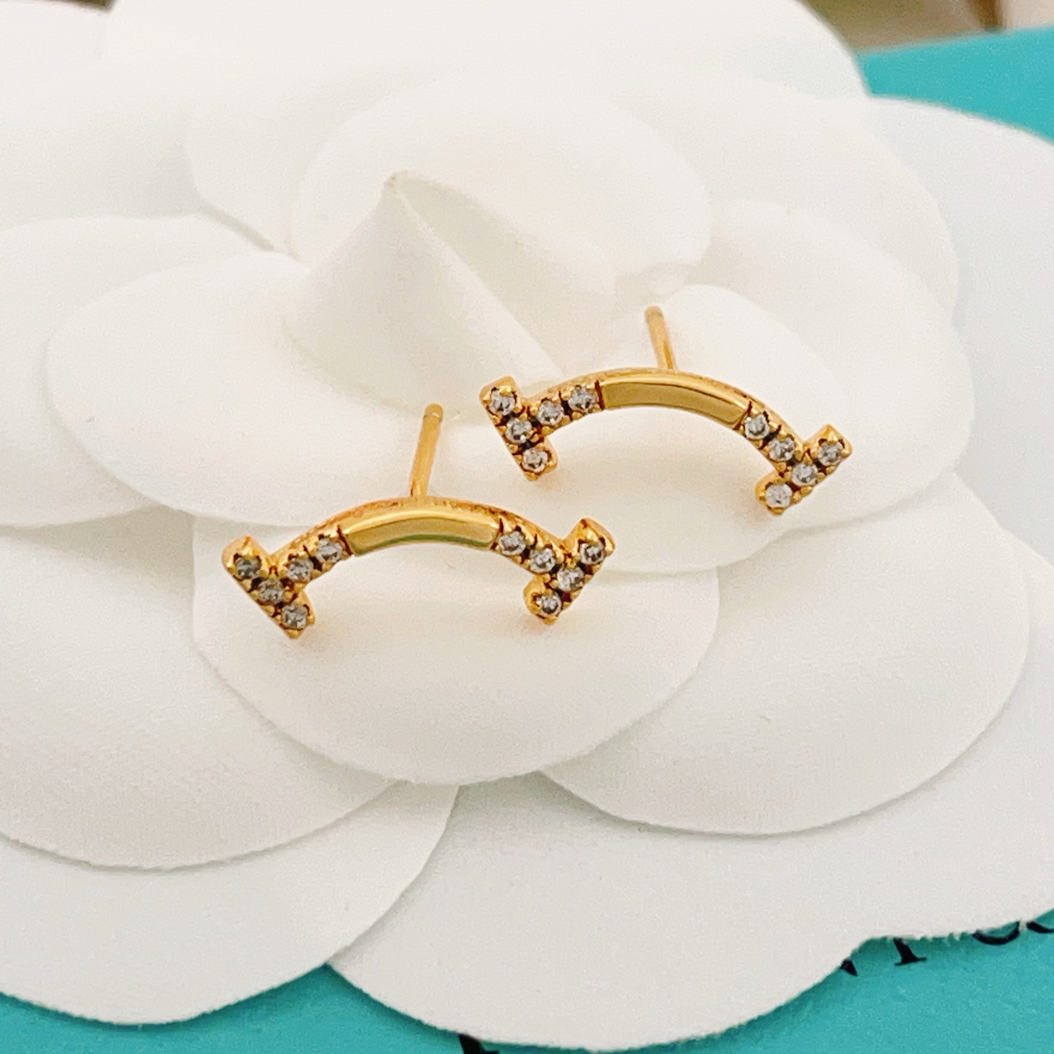 Tiffany Co T Smile earrings yellow gold with clear diamonds 12mm width