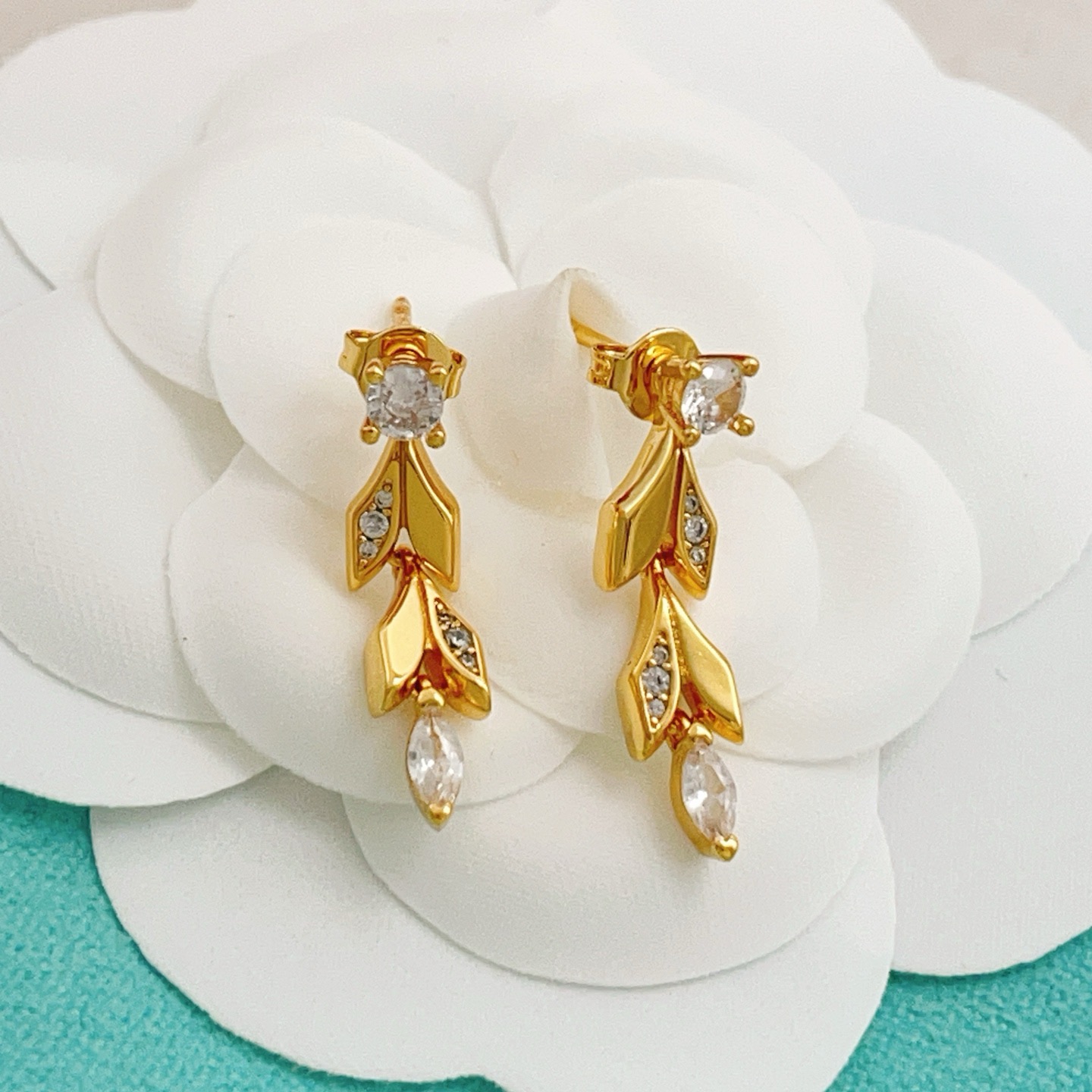 Tiffany Co Leaf Drop earrings yellow gold with clear faceted gemstones 2 5cm drop length