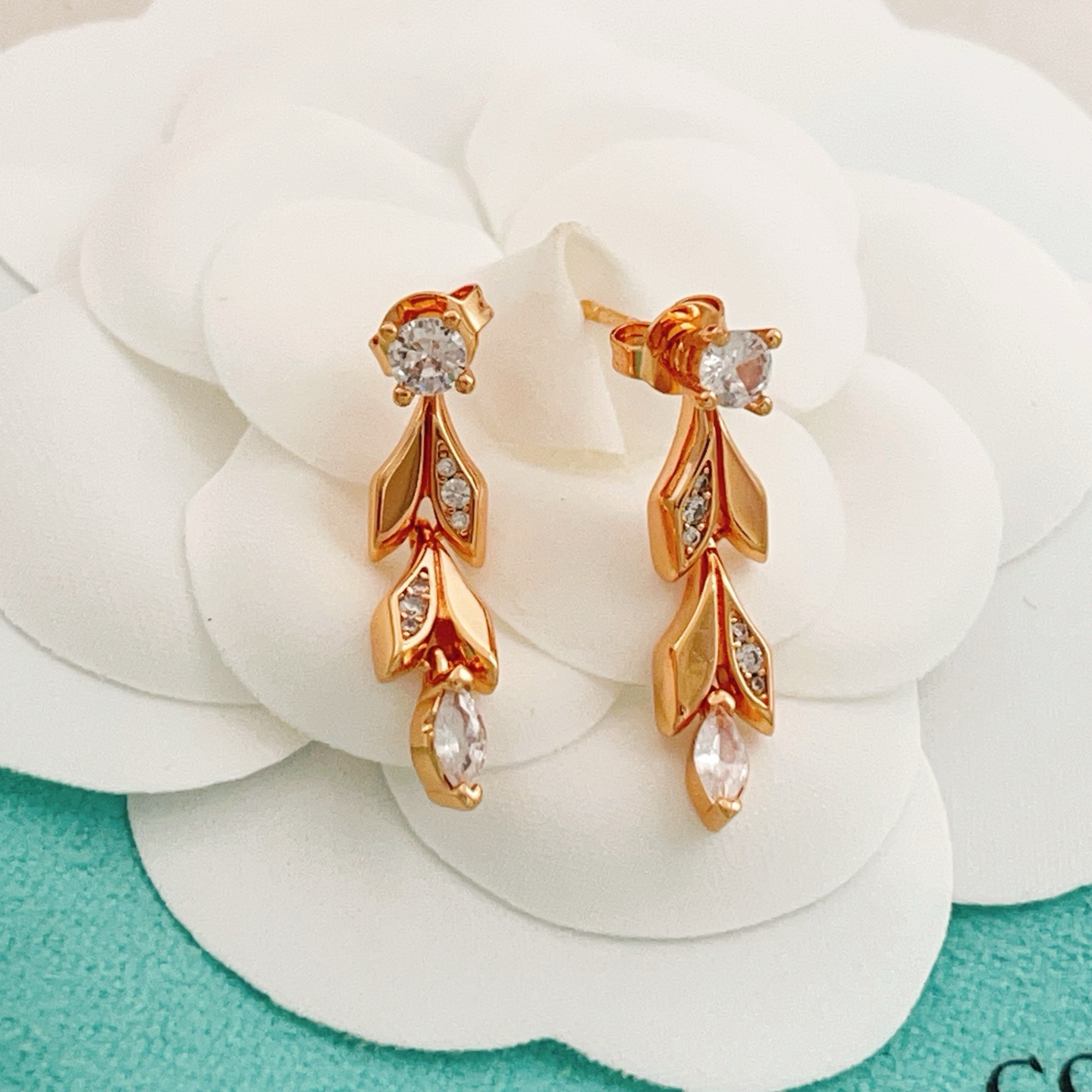 Tiffany Co Leaf Drop earrings Rose gold metal with clear faceted gemstones 2 5cm drop length