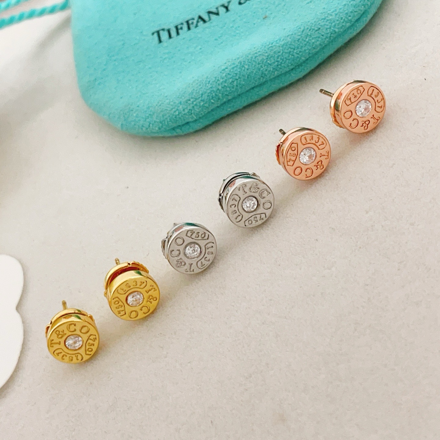 Tiffany Co 1837 Circle Stud Earrings earrings 18k yellow gold with clear round diamond accents 8mm diameter
