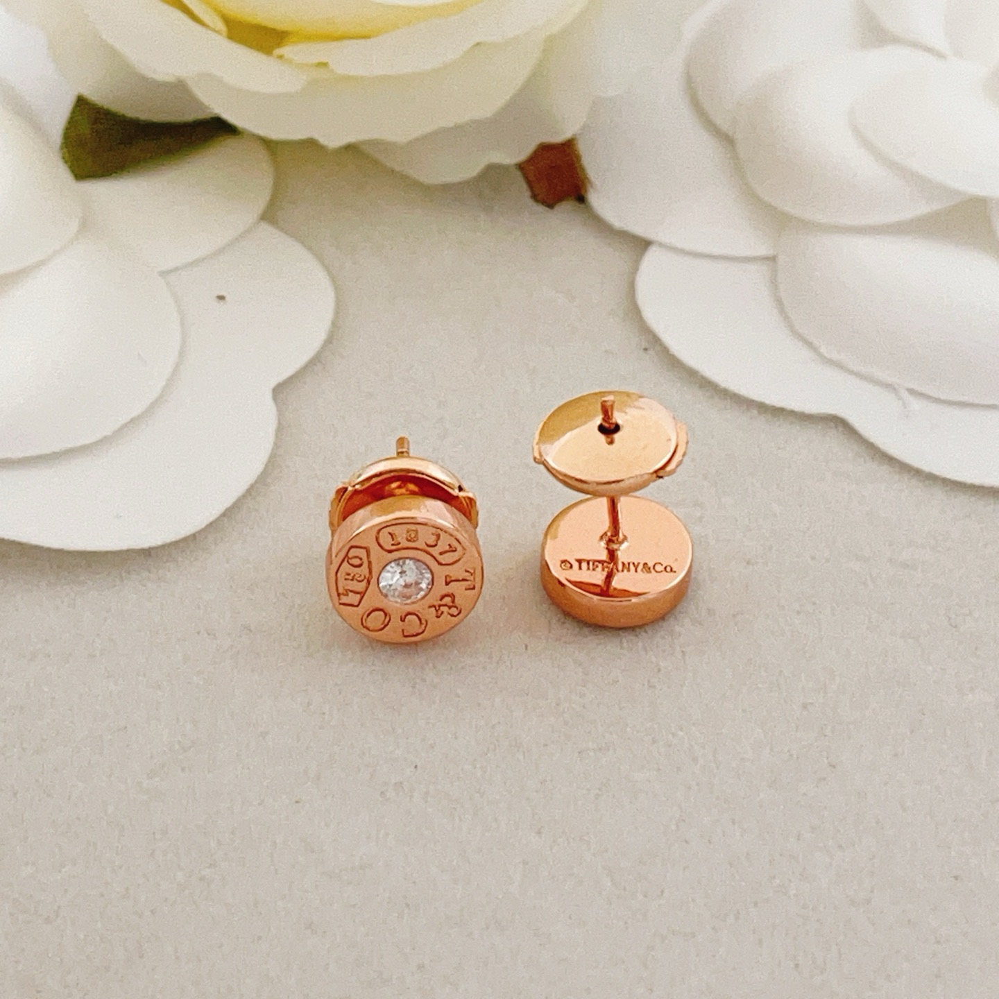 Tiffany 1837 Circle Stud Earrings earrings Rose gold metal with clear diamond accent 6mm stud diameter