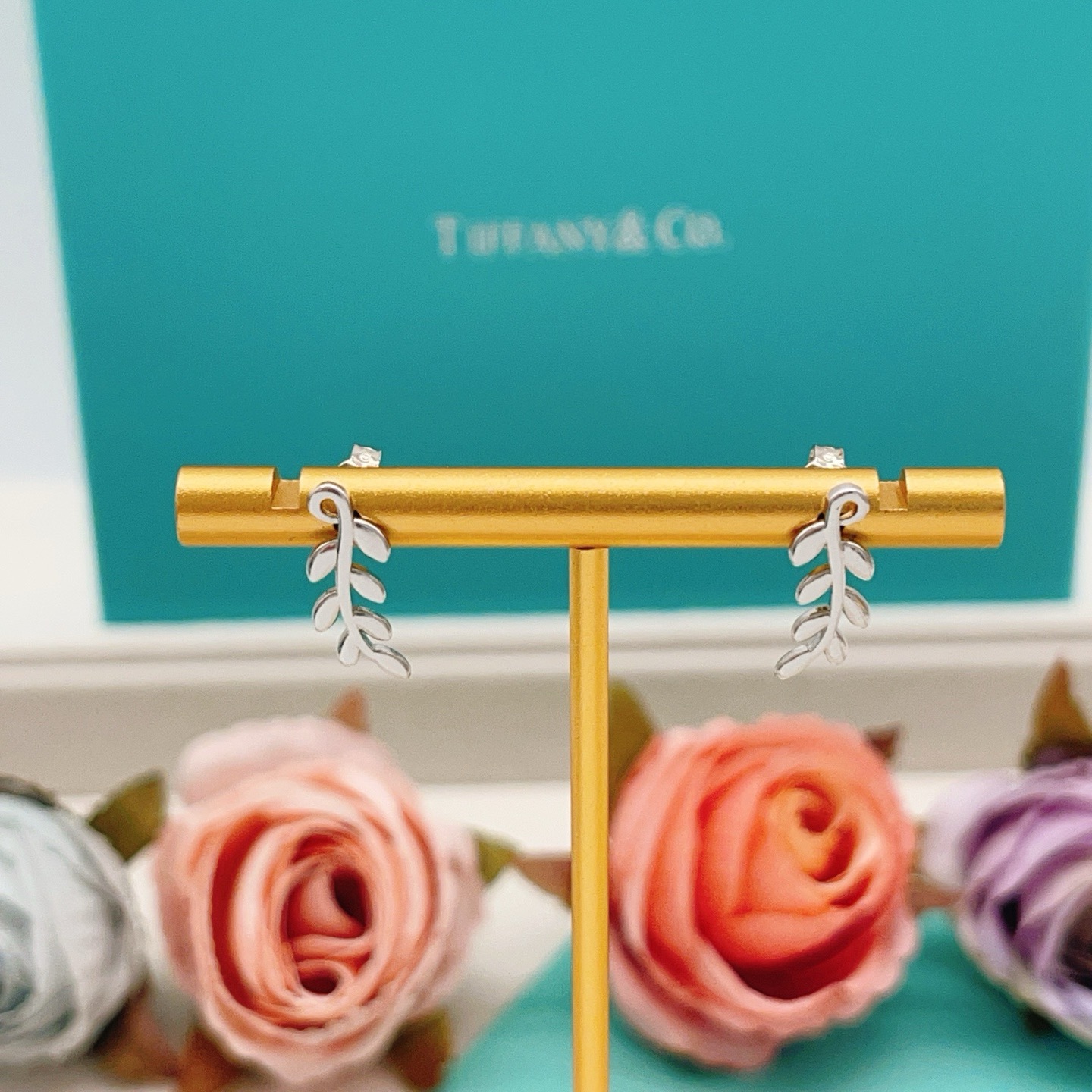 Tiffany Co Olive Leaf Climber Earrings earrings Sterling silver yellow gold rose gold polished metal with no gemstones 12mm length