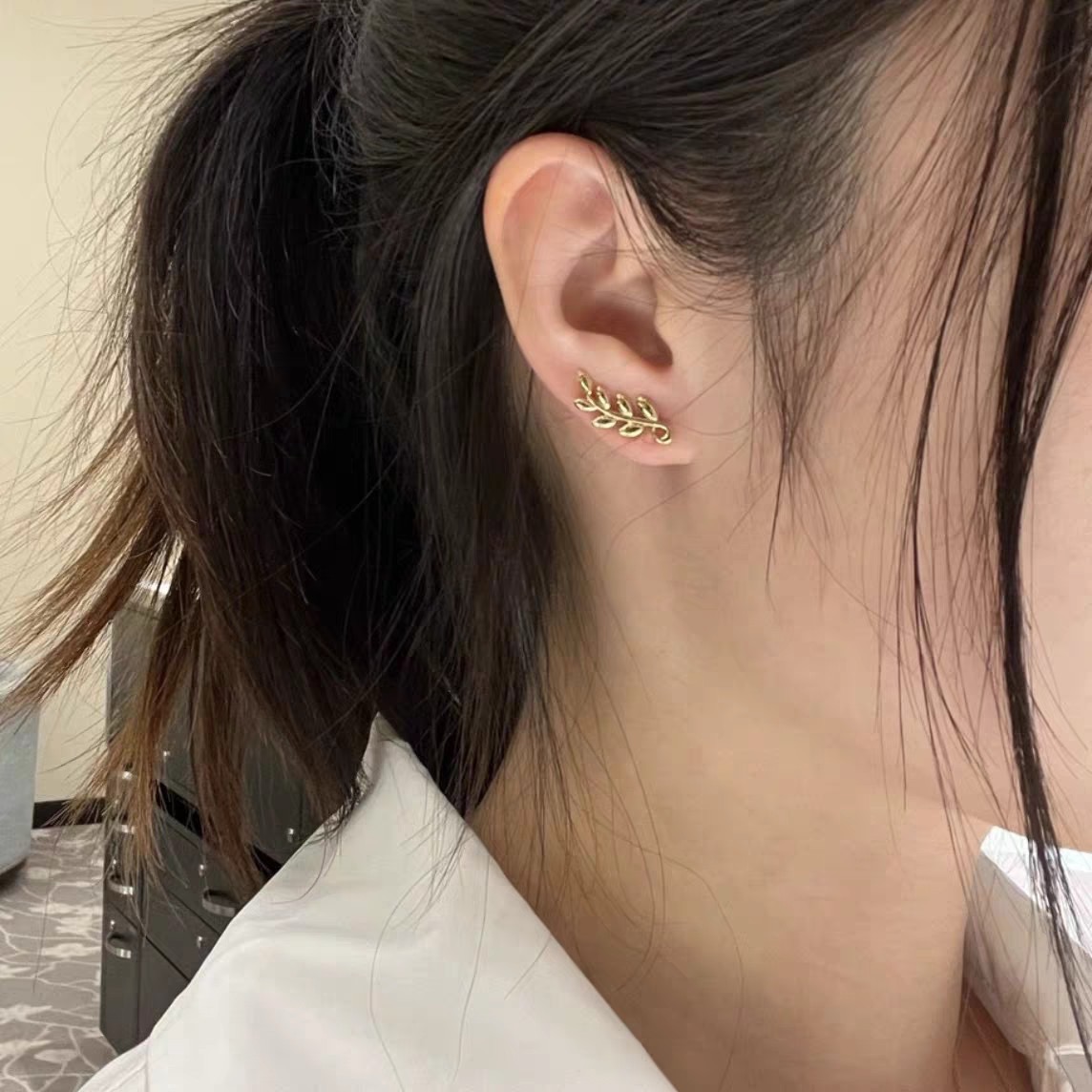 Tiffany Co Olive Leaf Climber Earrings earrings Sterling silver yellow gold rose gold polished metal with no gemstones 12mm length
