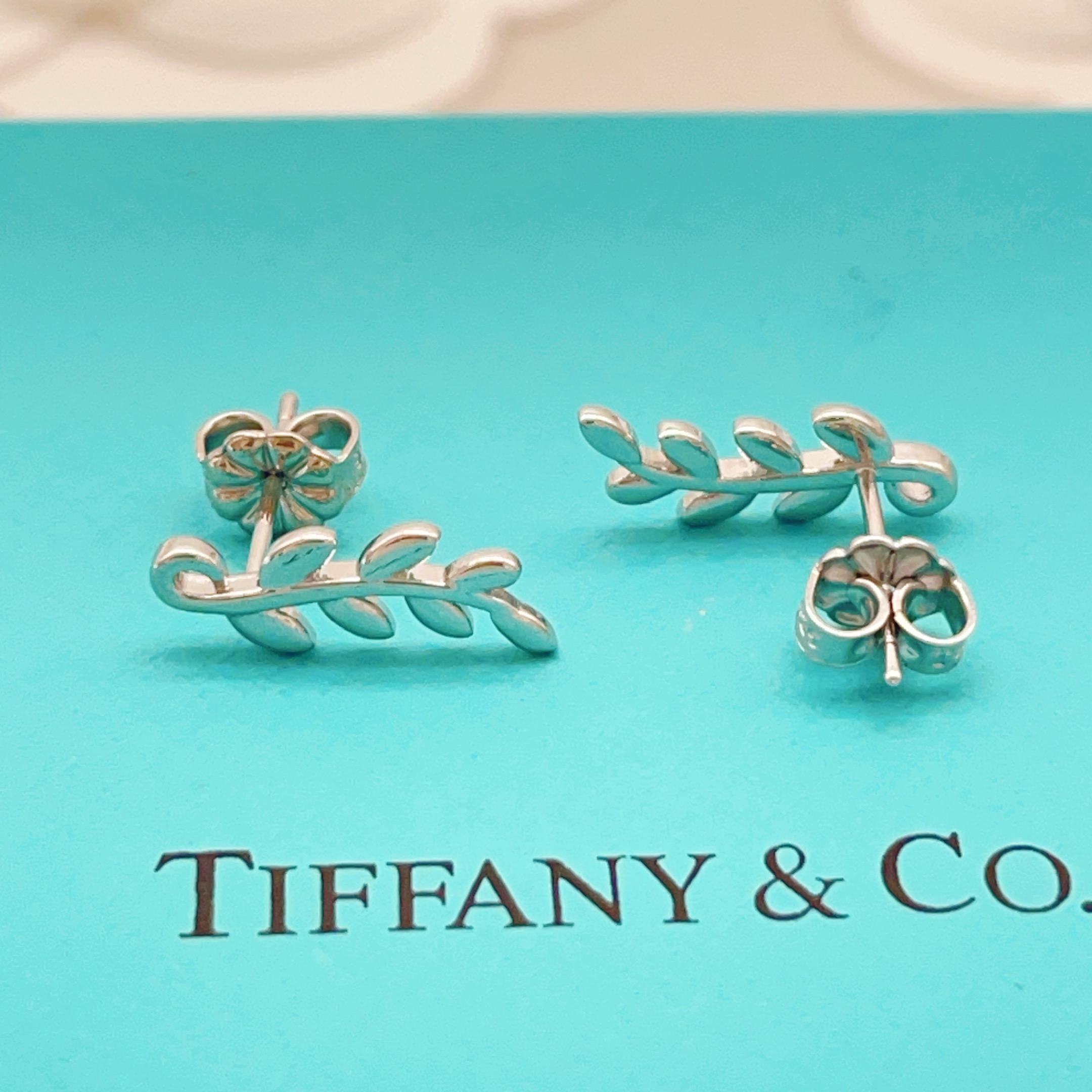 Tiffany Co Olive Leaf Climber Earrings earrings Sterling silver yellow gold rose gold polished metal with no gemstones 12mm length