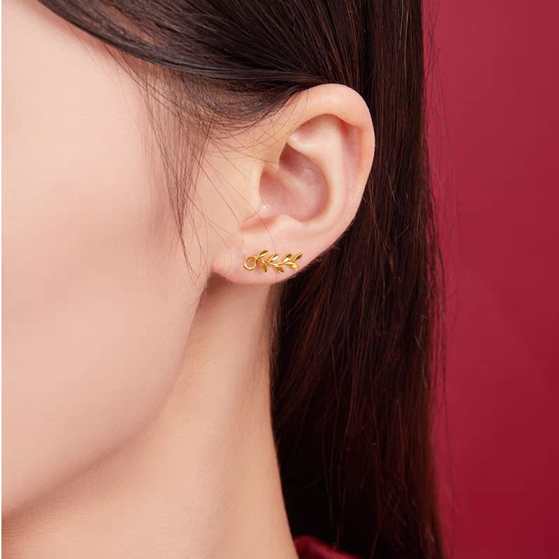 Tiffany Co Olive Leaf Climber Earrings earrings Available in 18k yellow gold sterling silver and 18k rose gold no gemstones 12mm length