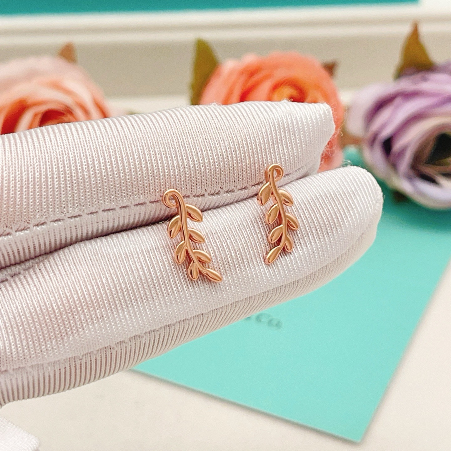 Tiffany Co Olive Leaf Climber Earrings earrings Available in 18k yellow gold sterling silver and 18k rose gold no gemstones 12mm length
