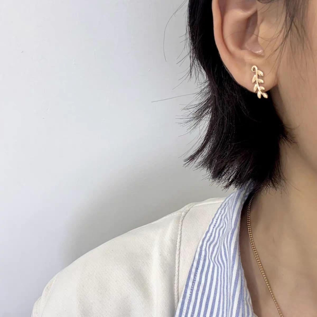 Tiffany Co Olive Leaf Climber Earrings earrings Available in 18k yellow gold sterling silver and 18k rose gold no gemstones 12mm length