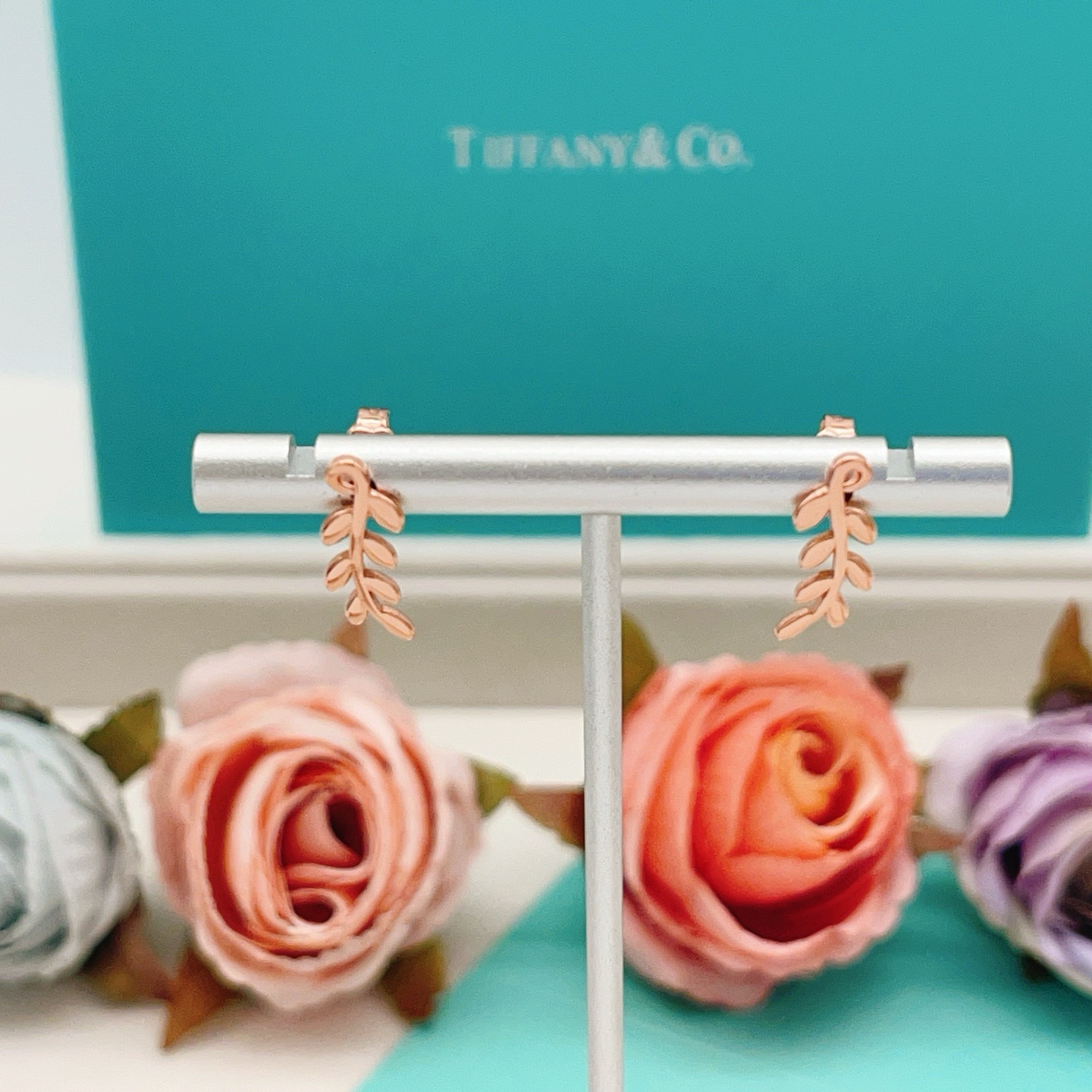 Tiffany Co Olive Leaf Climber Earrings earrings Available in 18k yellow gold sterling silver and 18k rose gold no gemstones 12mm length