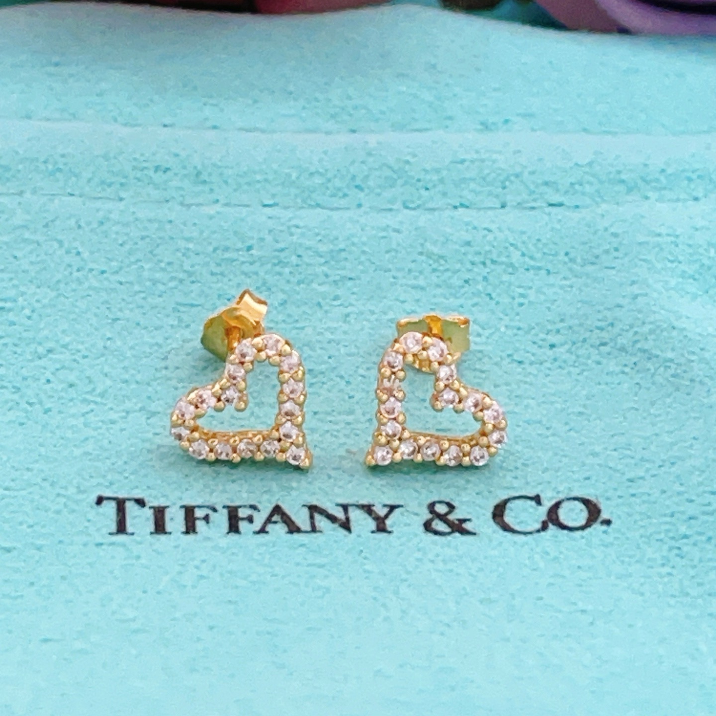 Tiffany Skeleton Heart earrings gold-tone metal with clear pave stones 8mm stud diameter