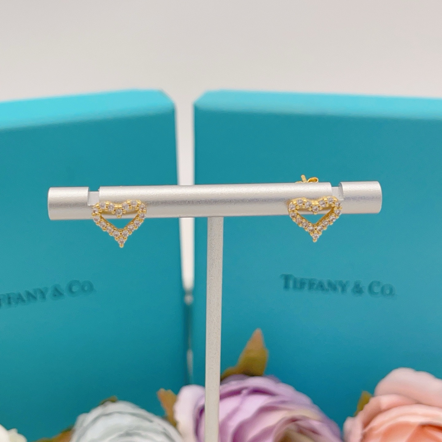 Tiffany Skeleton Heart earrings gold-tone metal with clear pave stones 8mm stud diameter