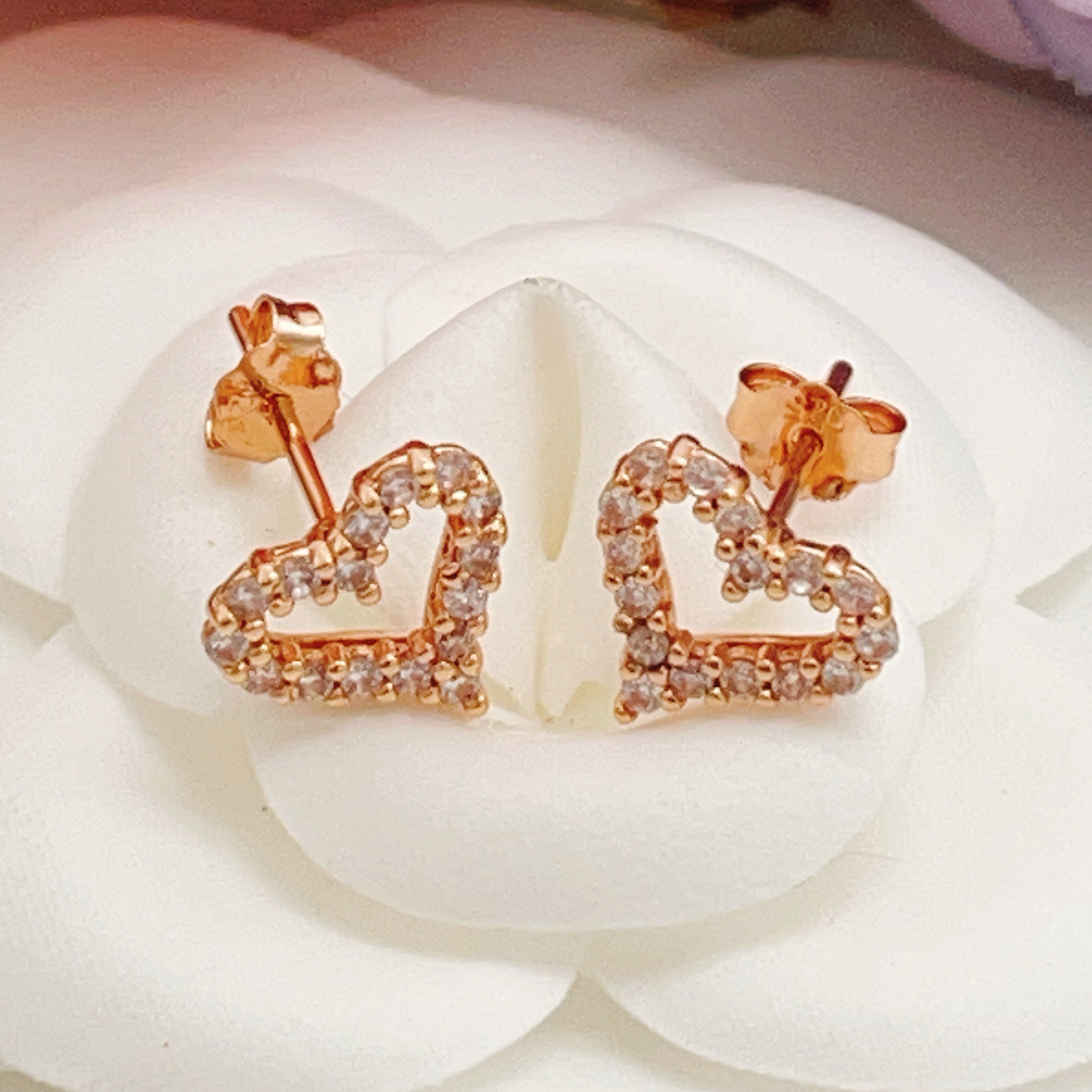 Tiffany Skeleton ZP Heart Stud Earrings earrings Available in yellow gold rose gold and silver-toned metal all set with clear faceted stones 8mm stud diameter