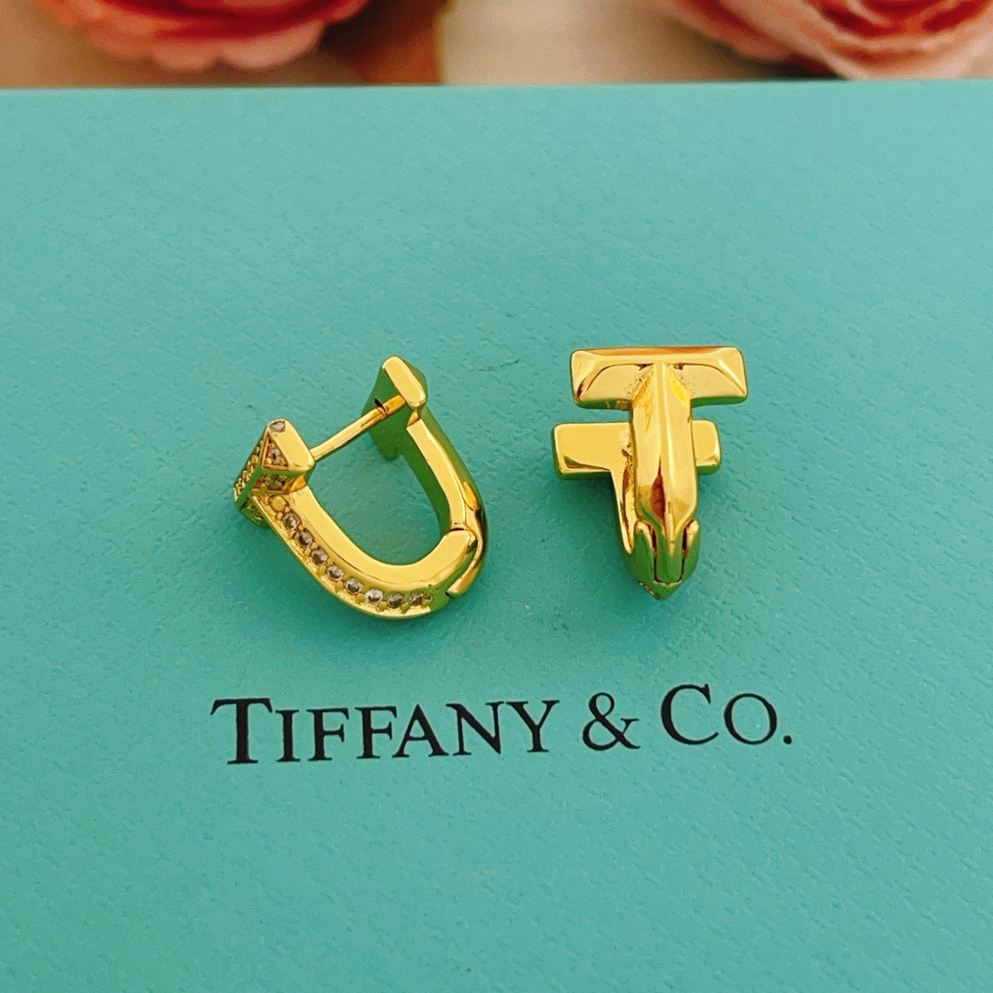 Tiffany Co Tiffany T earrings yellow gold with clear diamond accents 10mm hoop diameter