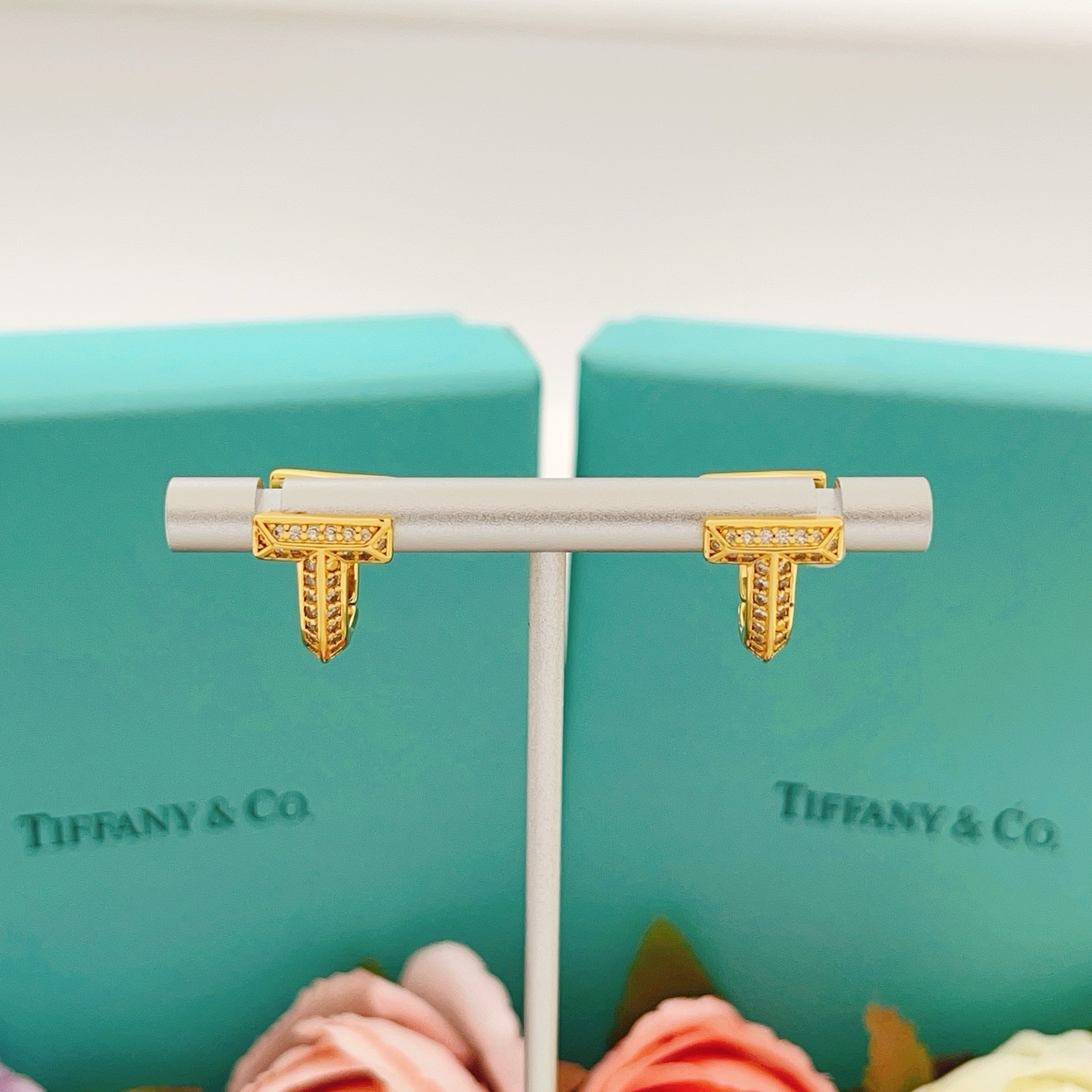 Tiffany Co Tiffany T earrings yellow gold with clear diamond accents 10mm hoop diameter