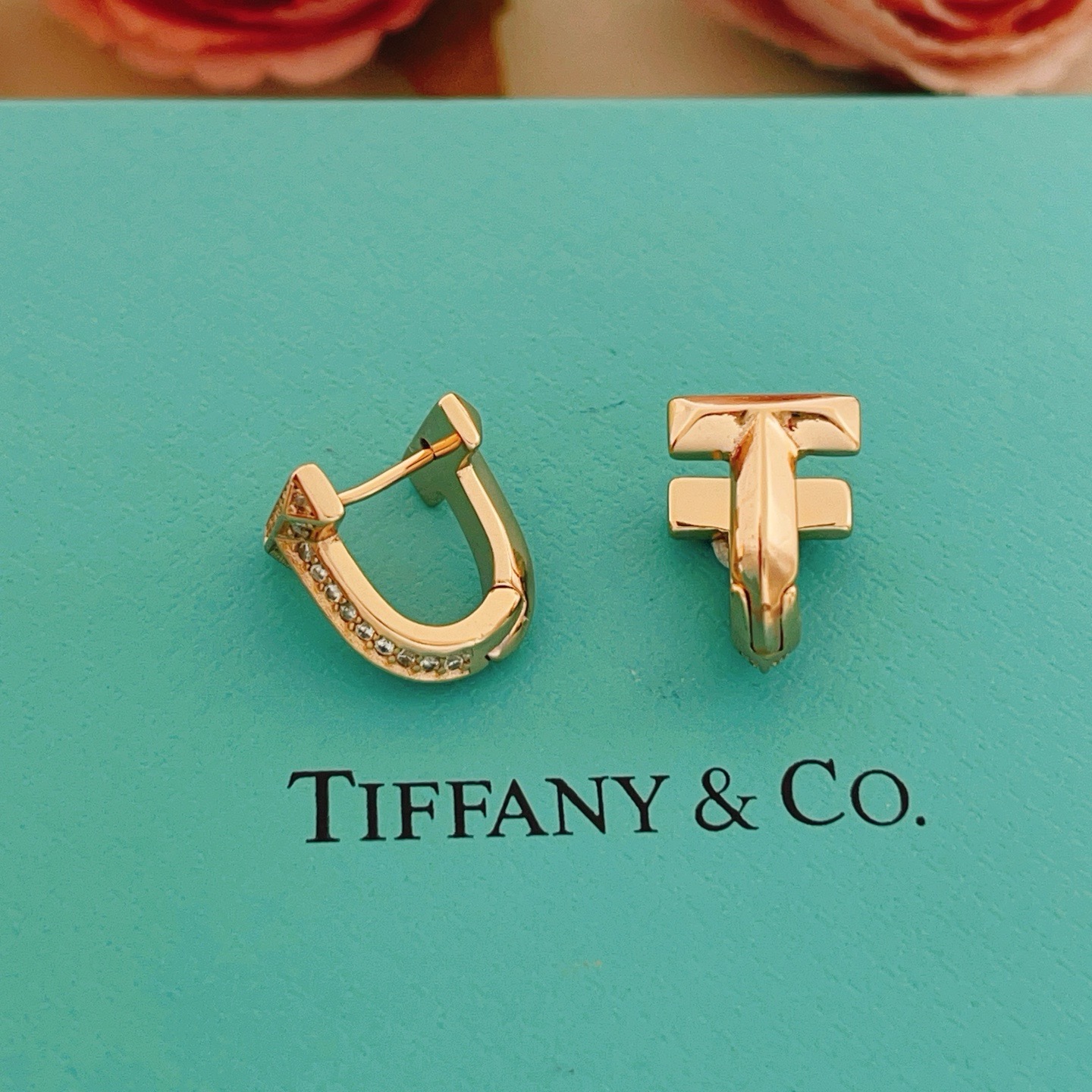Tiffany Co Tiffany T earrings 18k rose gold with pave set clear diamonds 12mm hoop diameter