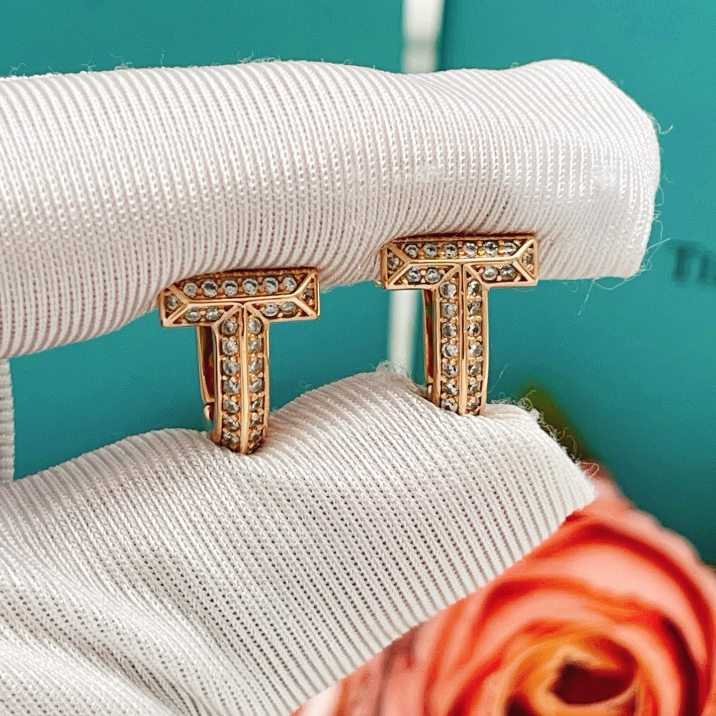 Tiffany Co Tiffany T earrings 18k rose gold with pave set clear diamonds 12mm hoop diameter