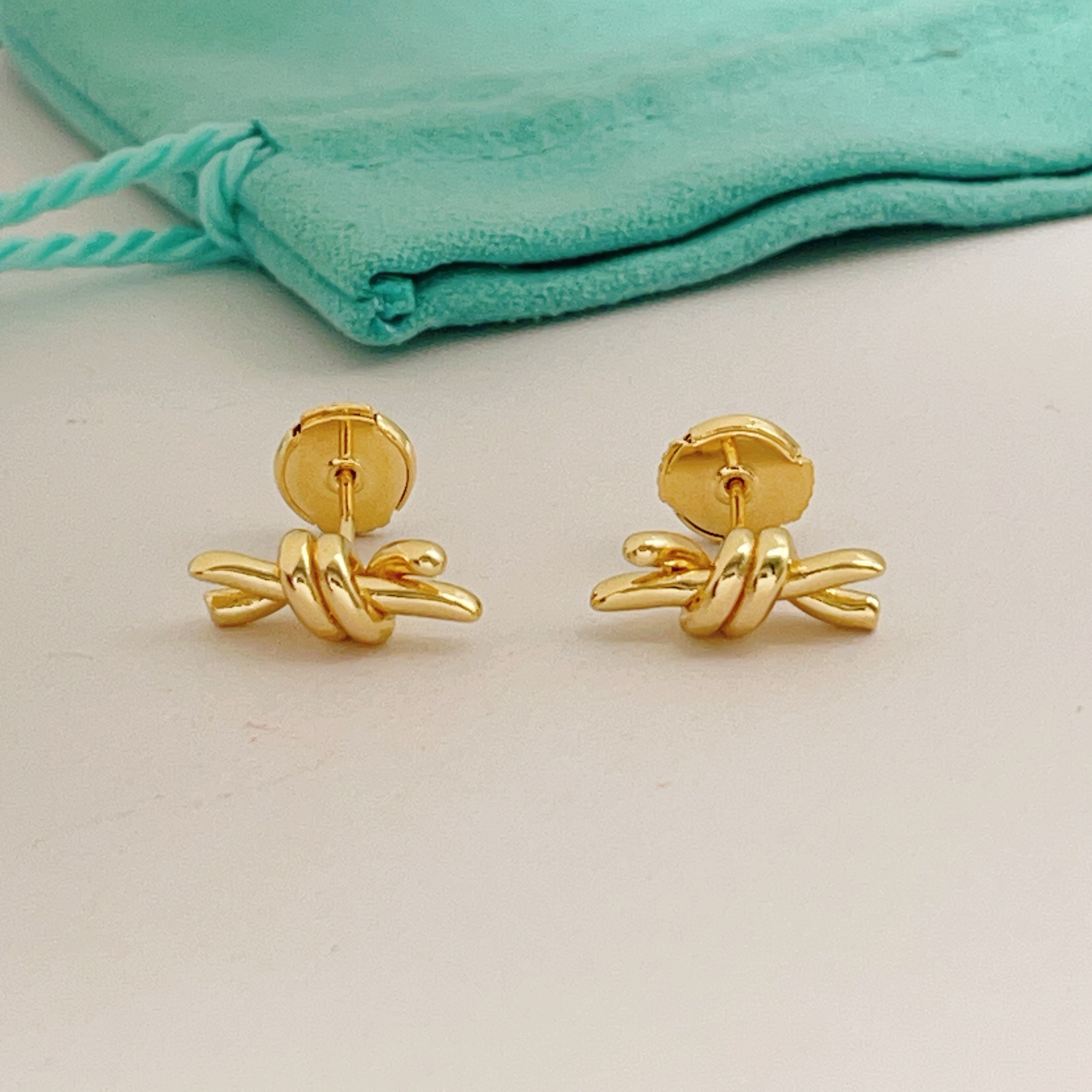 Tiffany Knot earrings gold tone metal no gemstones 12mm width