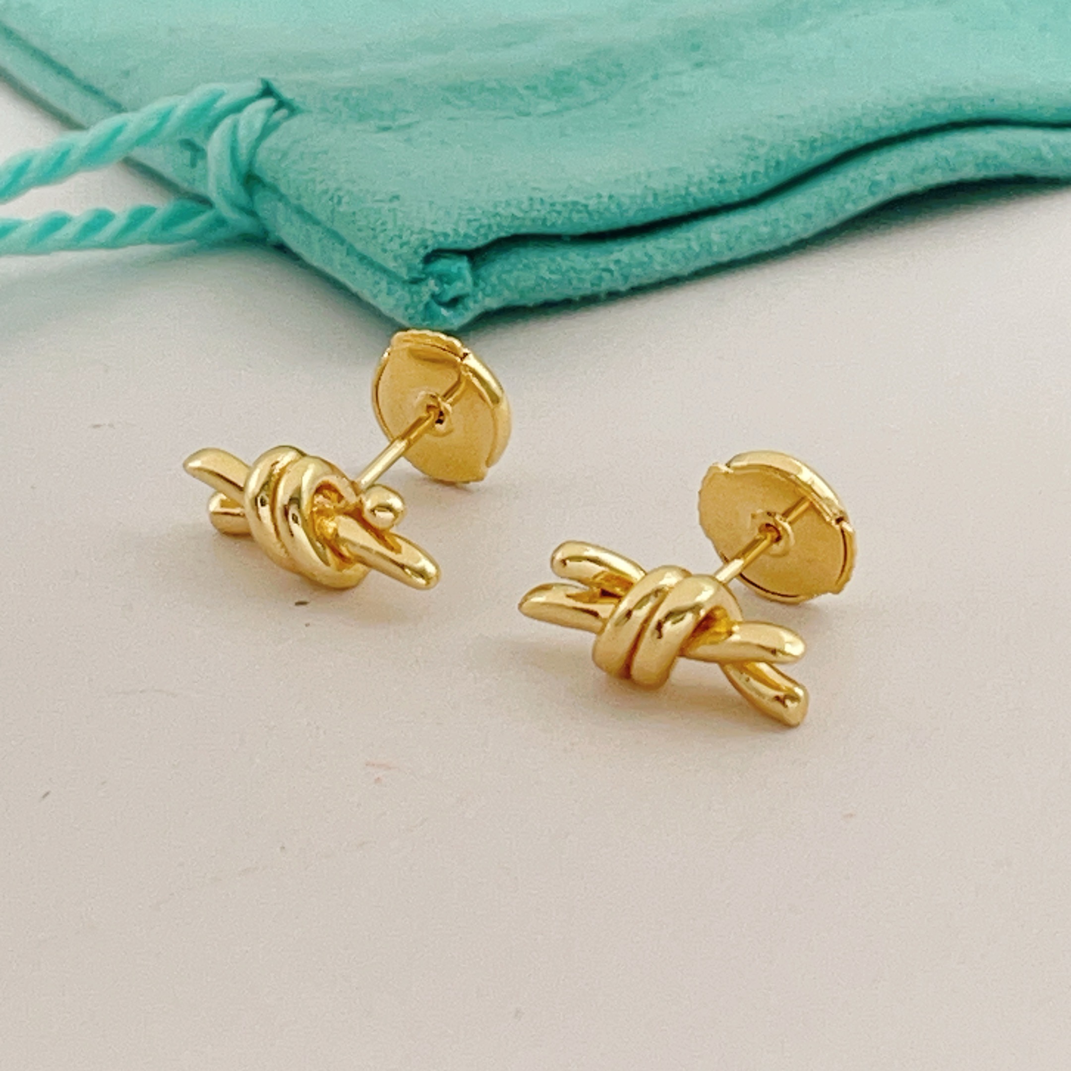 Tiffany Knot earrings gold tone metal no gemstones 12mm width