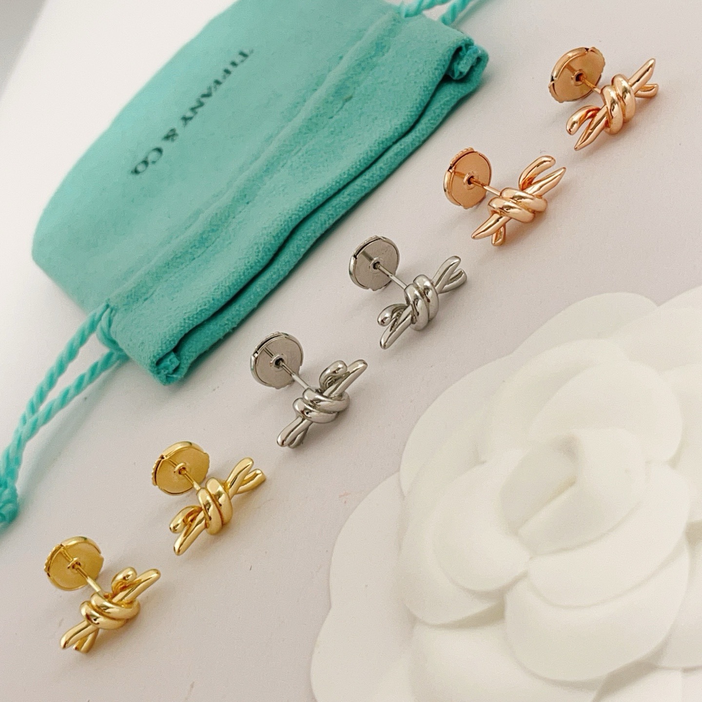 Tiffany Knot earrings gold tone metal no gemstones 12mm width