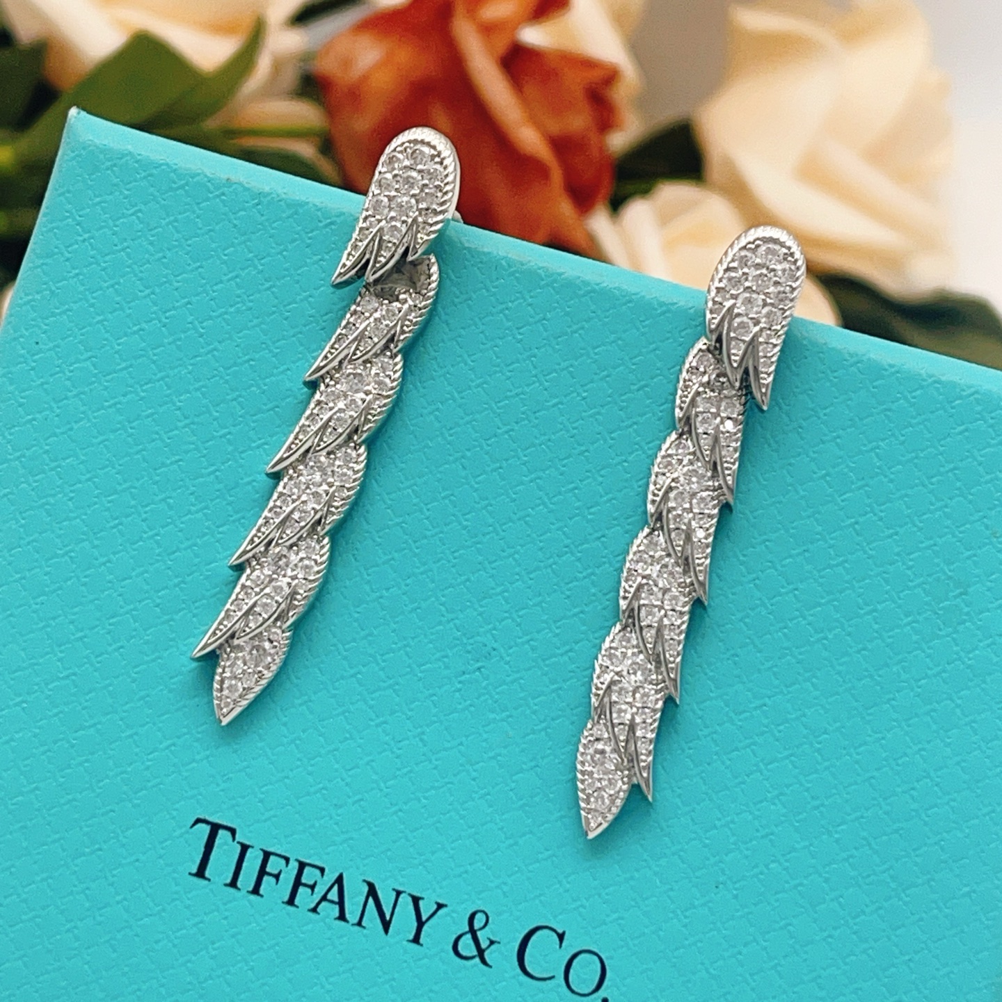 Tiffany Co Feather Pave Drop Earrings earrings Available in 18k yellow gold with clear diamonds 18k white gold with clear diamonds 18k rose gold with clear diamonds 4 5cm drop length