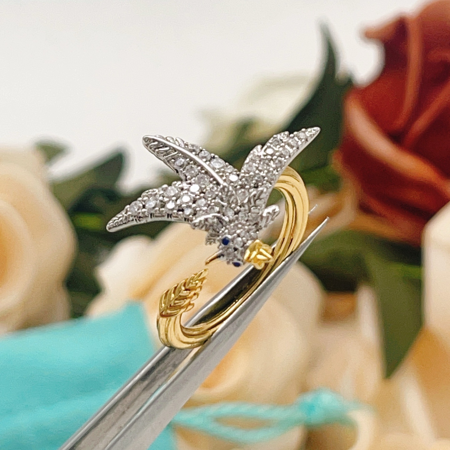 Tiffany Co 175th Anniversary Bird on a Wheat ring Two-tone yellow gold and platinum-plated metal clear pave diamonds blue sapphire eye US 7