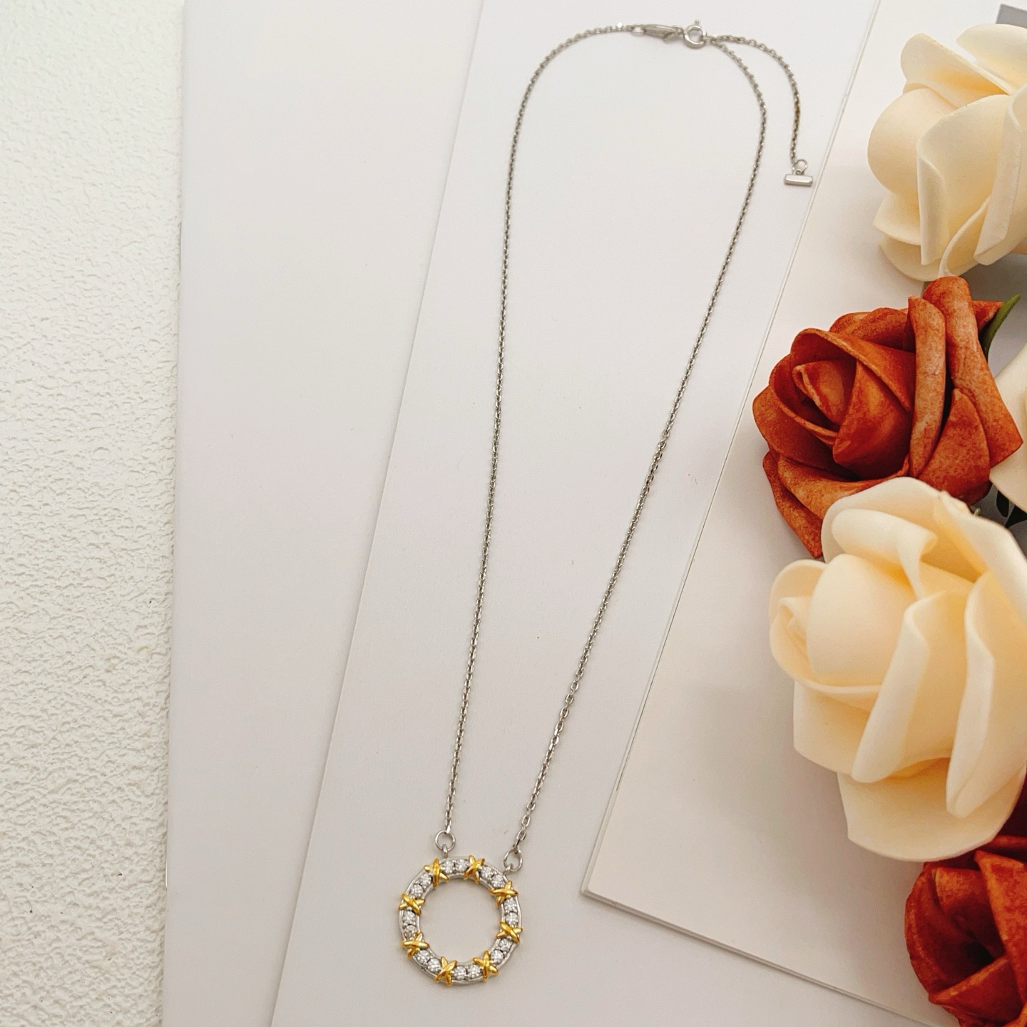 Tiffany Co Schlumberger X Circle Pendant necklace Sterling silver and 18k gold with clear diamonds 16 inches