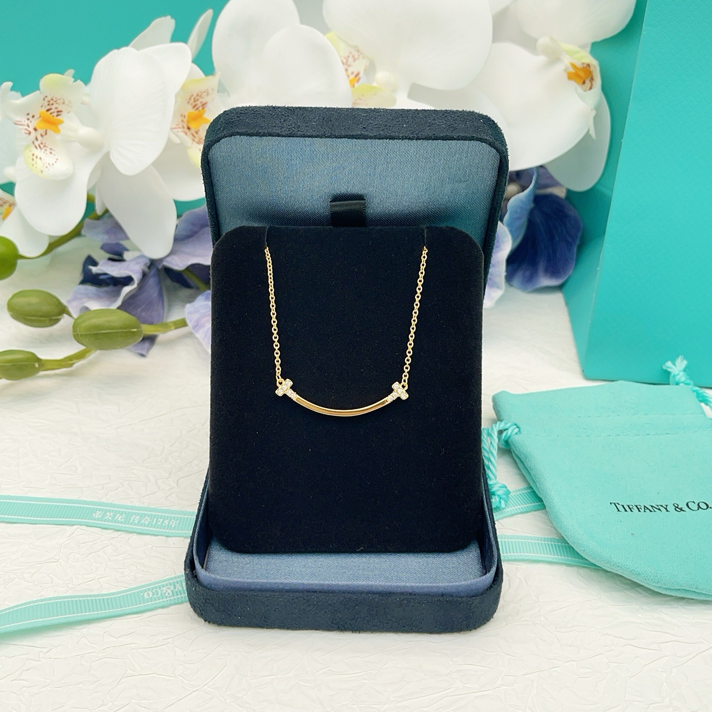 Tiffany Co T Smile necklace 18k yellow gold with clear diamond accents 16-18 inch adjustable chain