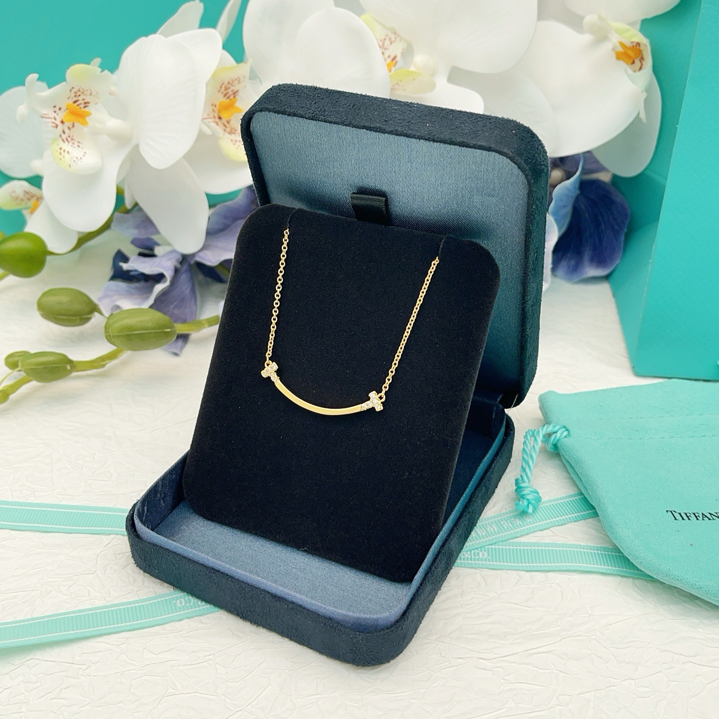 Tiffany Co T Smile necklace 18k yellow gold with clear diamond accents 16-18 inch adjustable chain