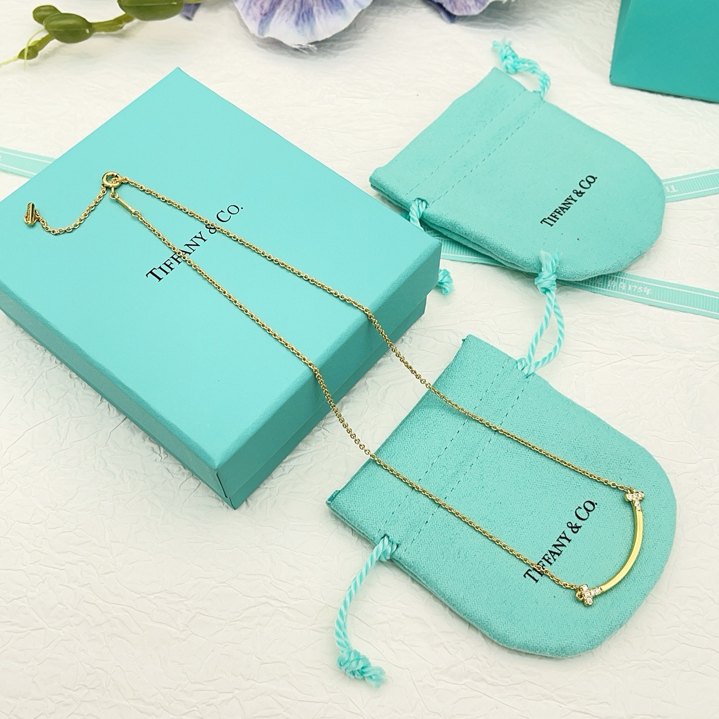 Tiffany Co T Smile necklace 18k yellow gold with clear diamond accents 16-18 inch adjustable chain
