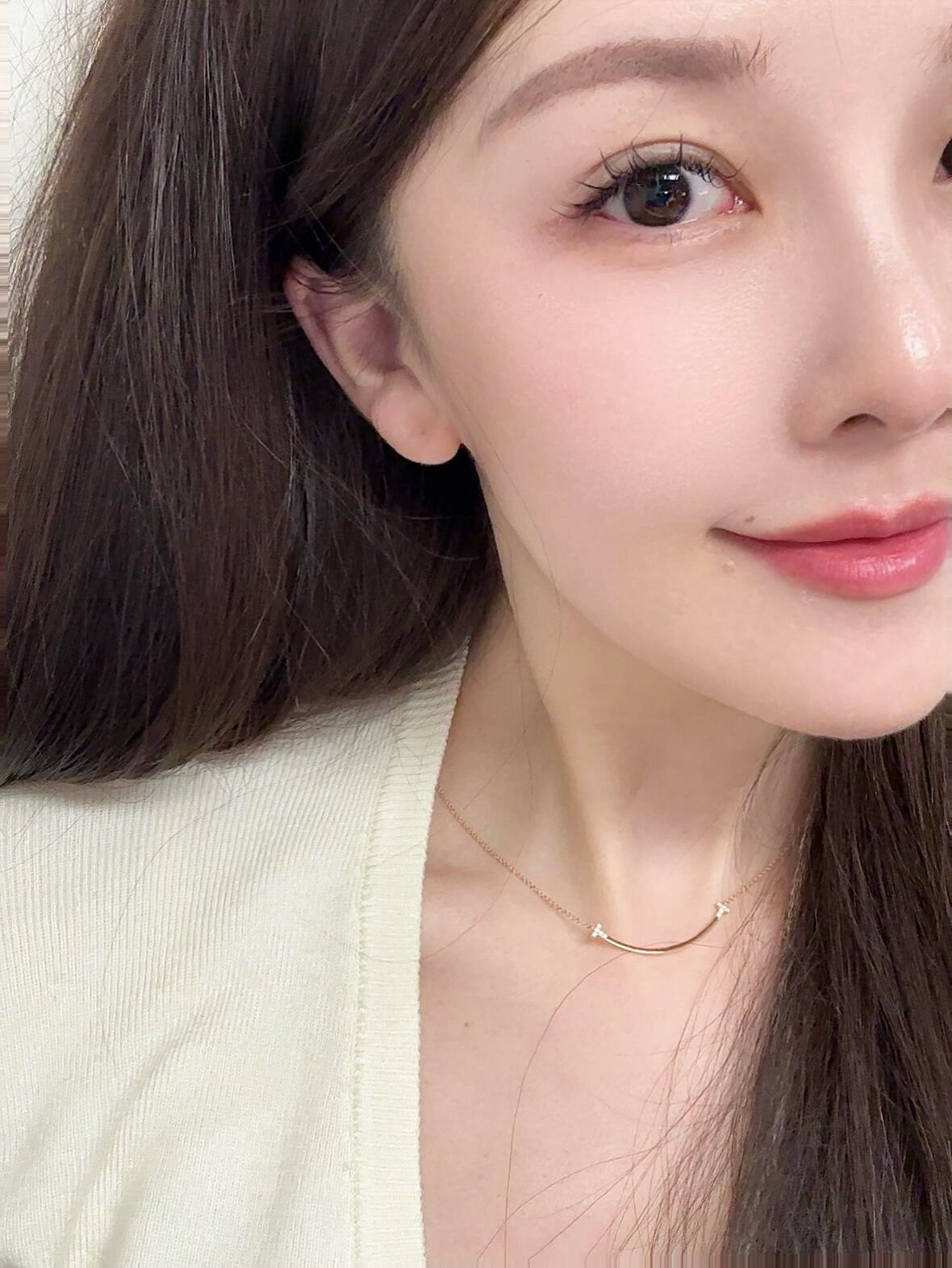 Tiffany Co T Smile necklace 18k yellow gold 18k white gold 18k rose gold with clear diamond accents 16-18 inch adjustable chain