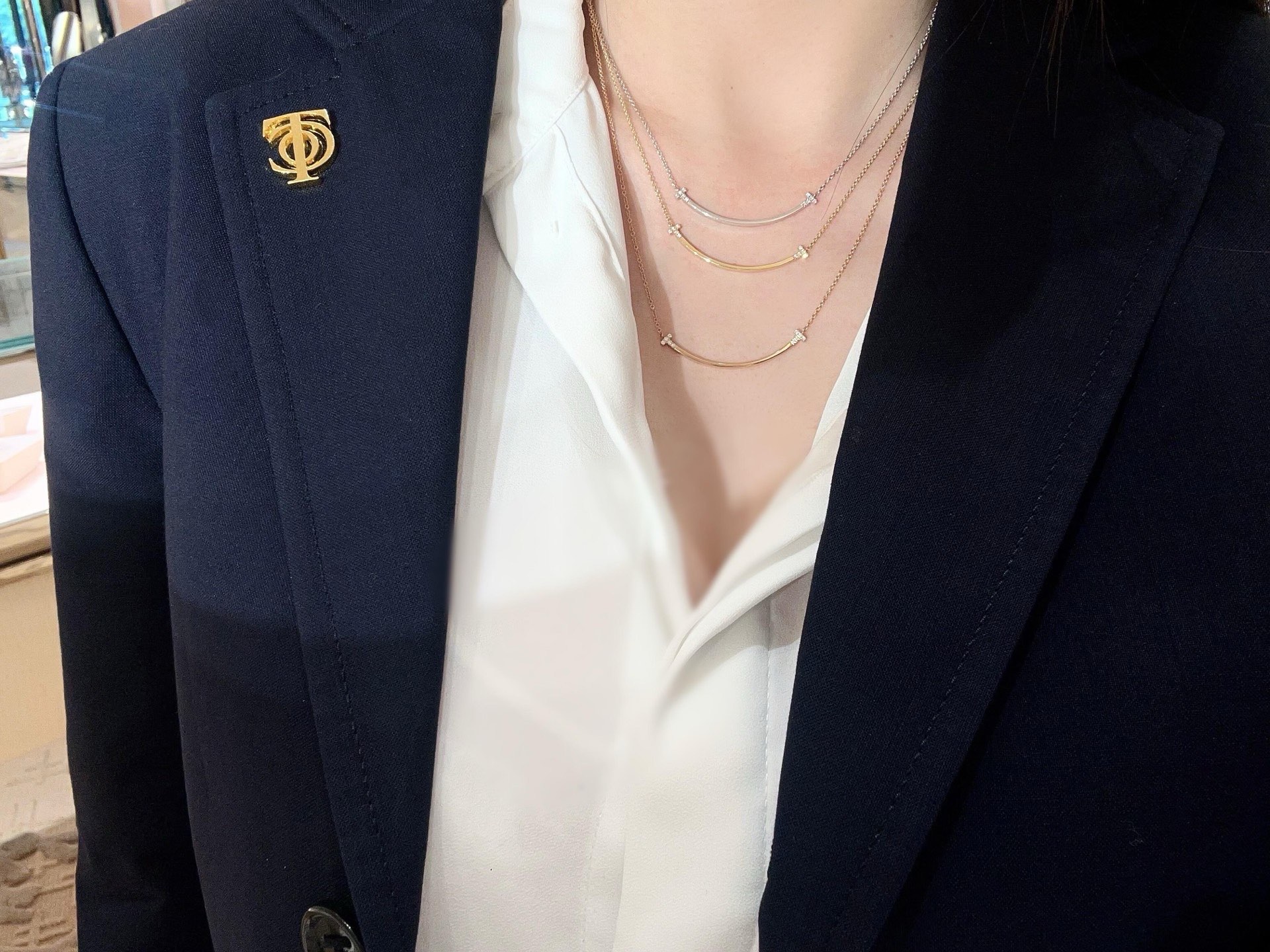 Tiffany Co T Smile necklace 18k yellow gold 18k white gold 18k rose gold with clear diamond accents 16-18 inch adjustable chain