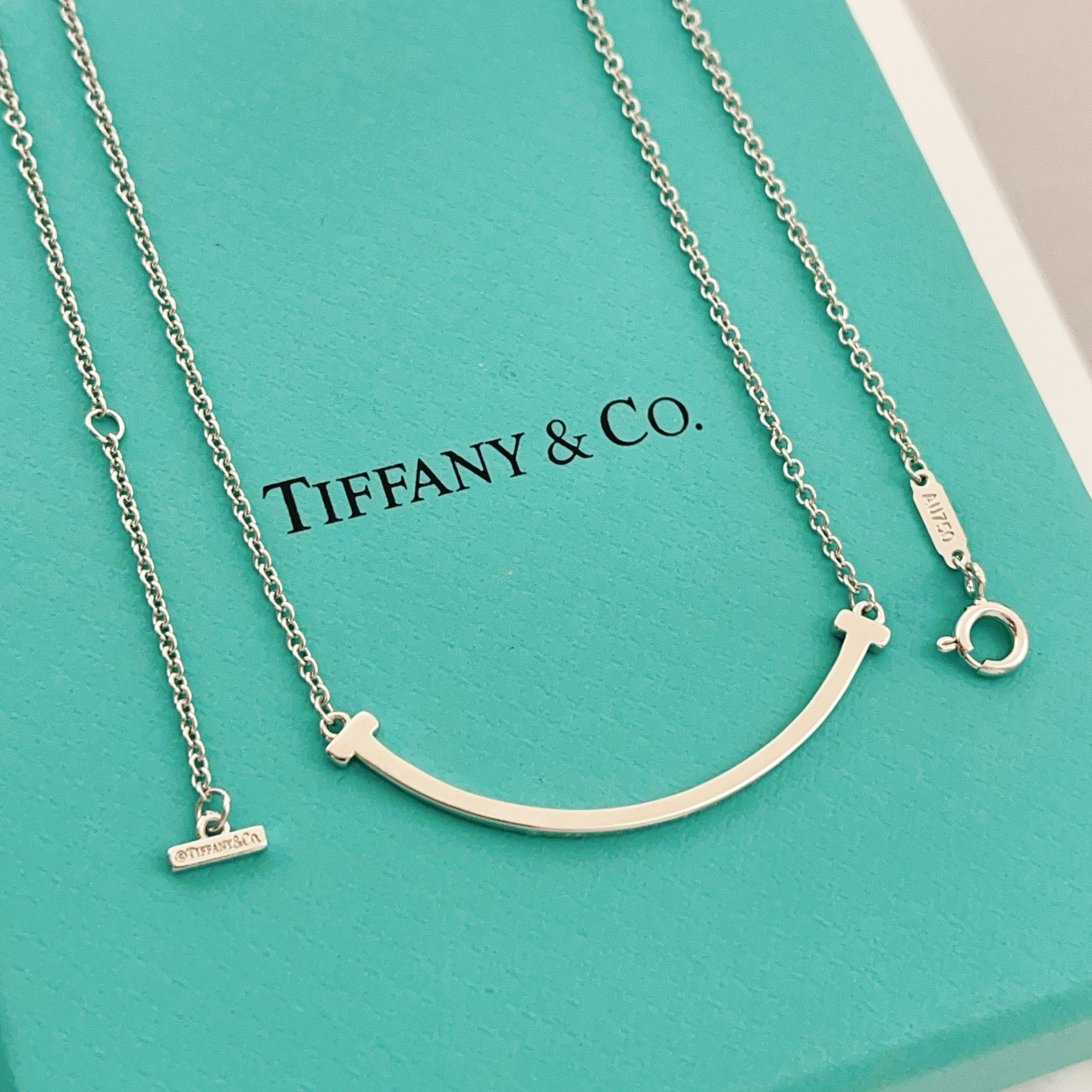 Tiffany Co T Smile necklace 18k rose gold 18k white gold 18k yellow gold no gemstones 16-18 inches adjustable