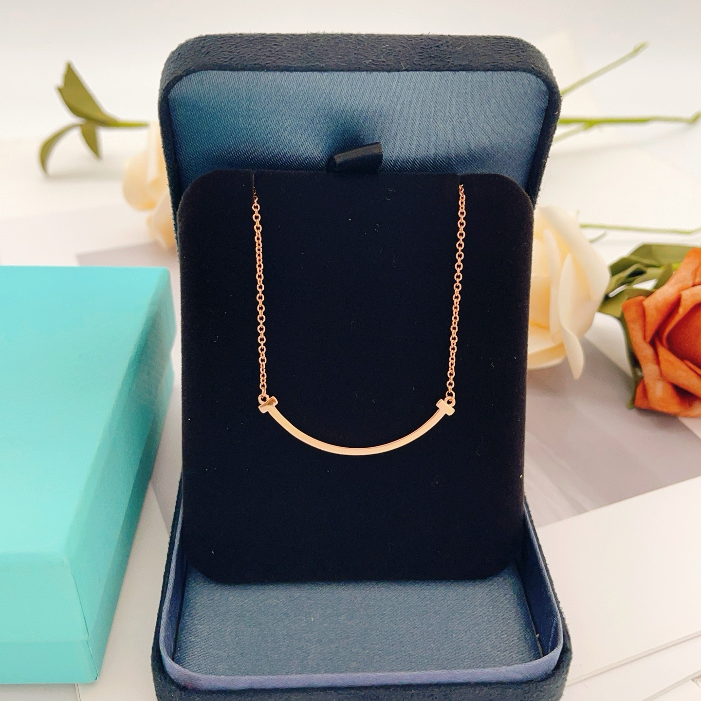 Tiffany Co T Smile necklace Available in 18k yellow gold 18k rose gold and sterling silver no gemstones 45cm