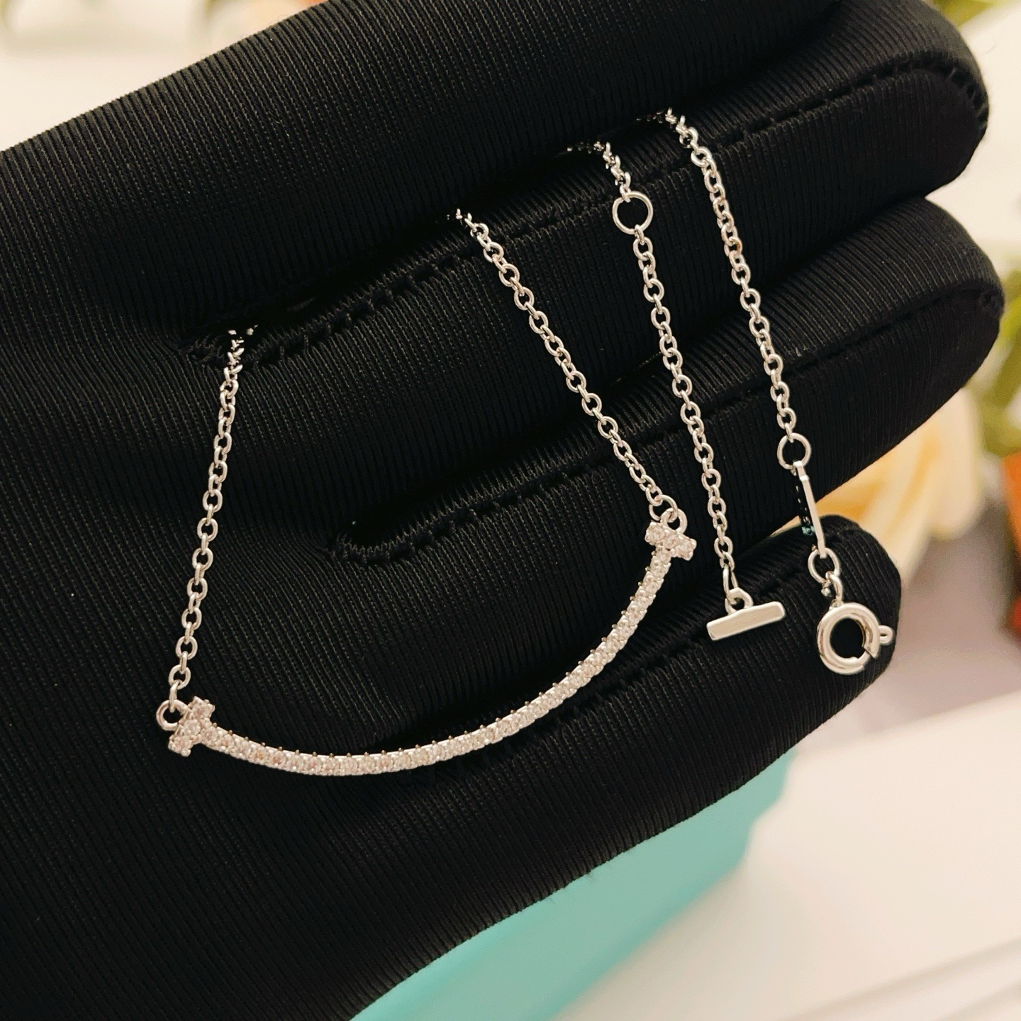 Tiffany Co T Smile necklace silver-toned white gold with clear diamond accents 16-18 inches adjustable