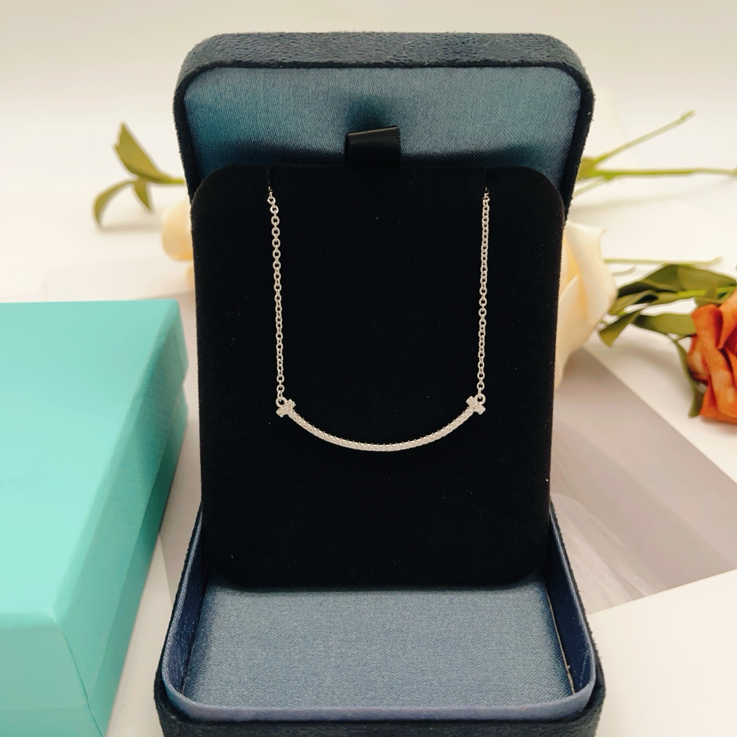 Tiffany Co T Smile necklace silver-toned white gold with clear diamond accents 16-18 inches adjustable