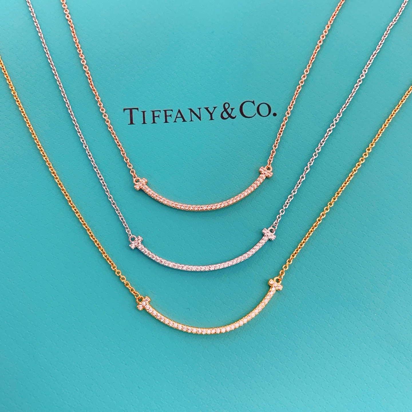 Tiffany Co T Smile necklace yellow gold with clear diamond accents 16-18 inches adjustable