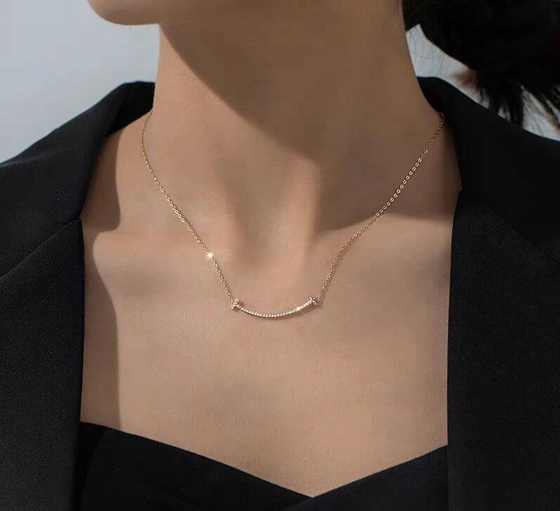 Tiffany Co T Smile necklace yellow gold with clear diamond accents 16-18 inches adjustable