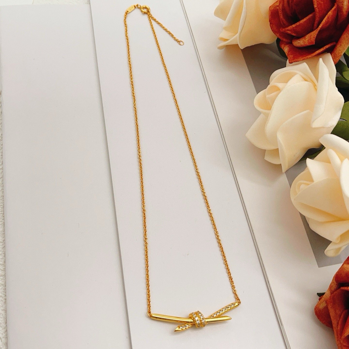 Tiffany Knot necklace Yellow gold with clear diamond accents 45cm