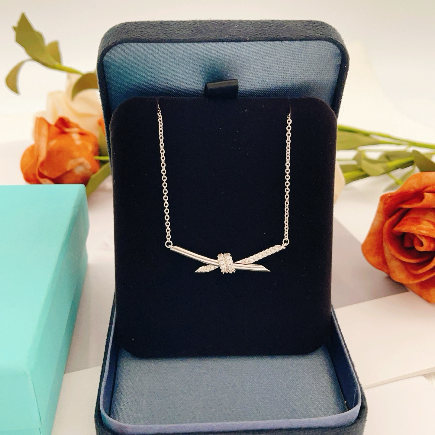 Tiffany Co Tiffany Knot necklace sterling silver with clear diamond accents 40cm with 5cm extender