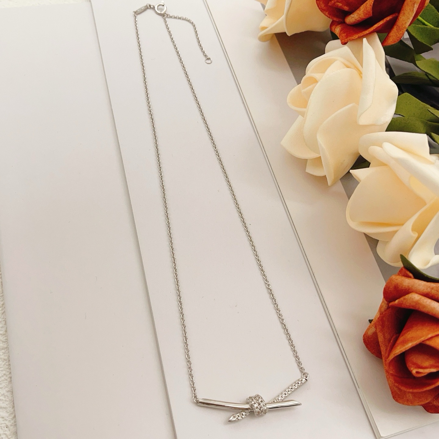 Tiffany Co Tiffany Knot necklace sterling silver with clear diamond accents 40cm with 5cm extender