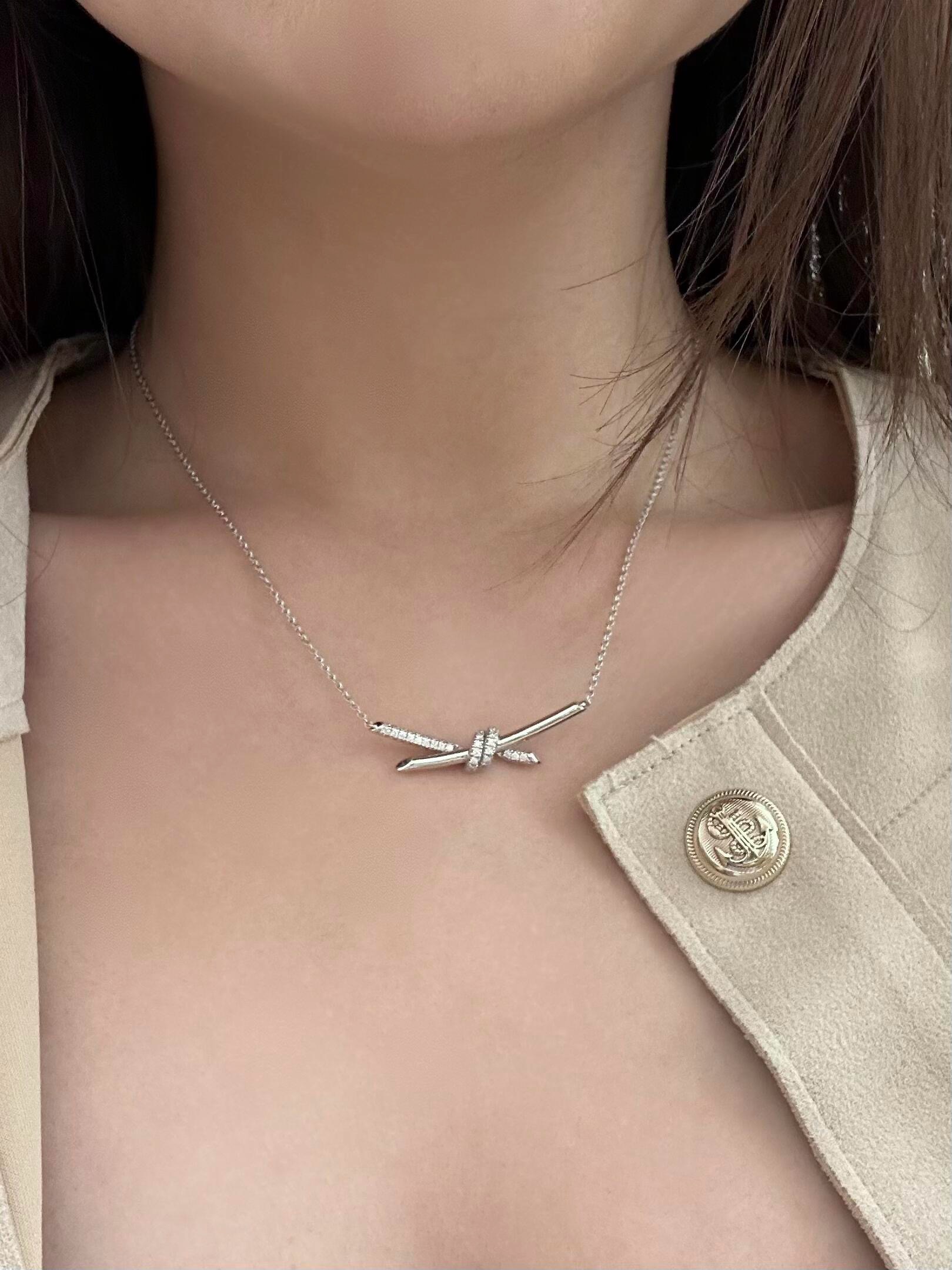 Tiffany Co Tiffany Knot necklace sterling silver with clear diamond accents 40cm with 5cm extender