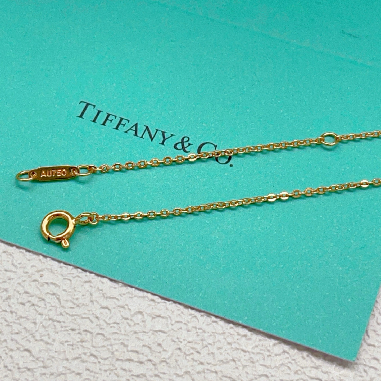 Tiffany Co Schlumberger Lynn necklace yellow gold with clear diamond accents 16 inches