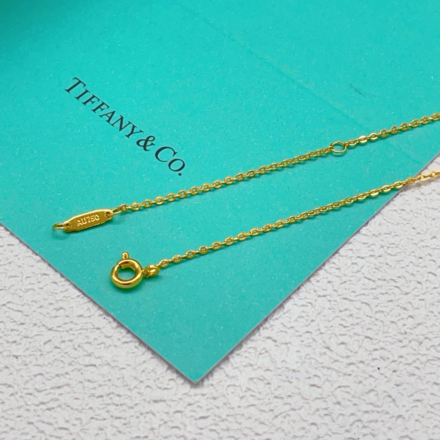 Tiffany Co Schlumberger Lynn necklace yellow gold with pink ruby gemstones 16 inches